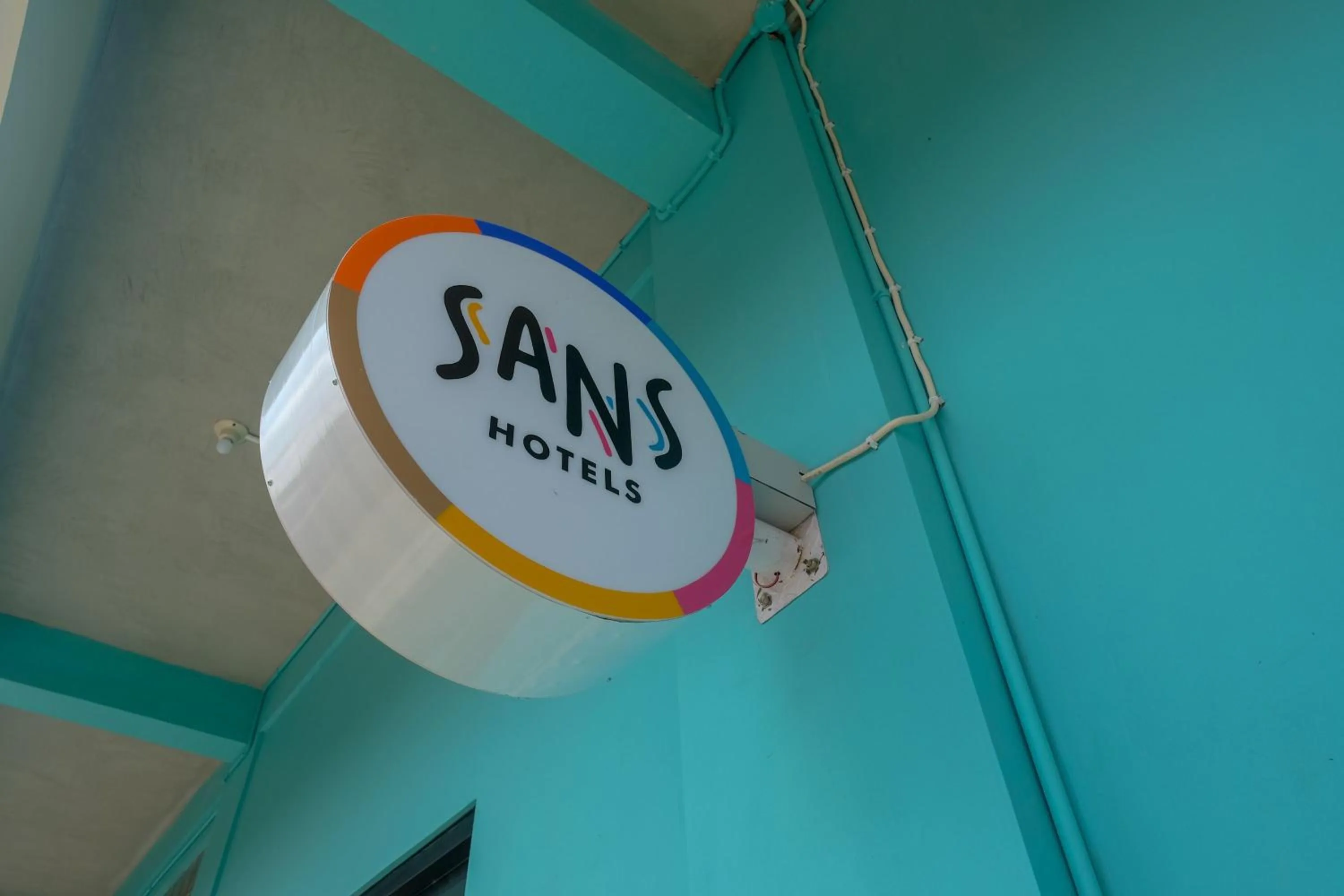 Property logo or sign in Sans Hotel Kumbang Yogyakarta by RedDoorz