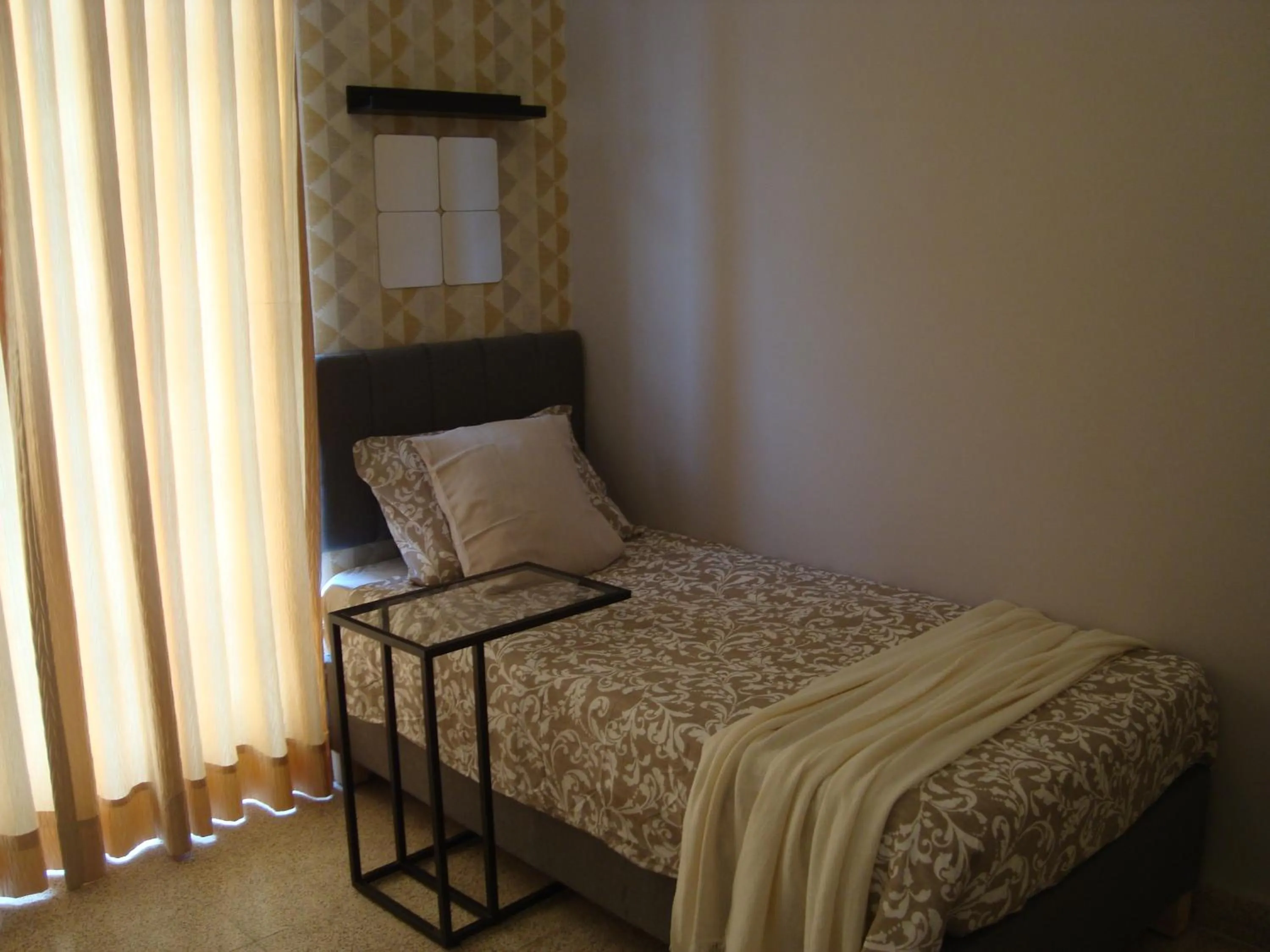 Bed in Gallery Hotel