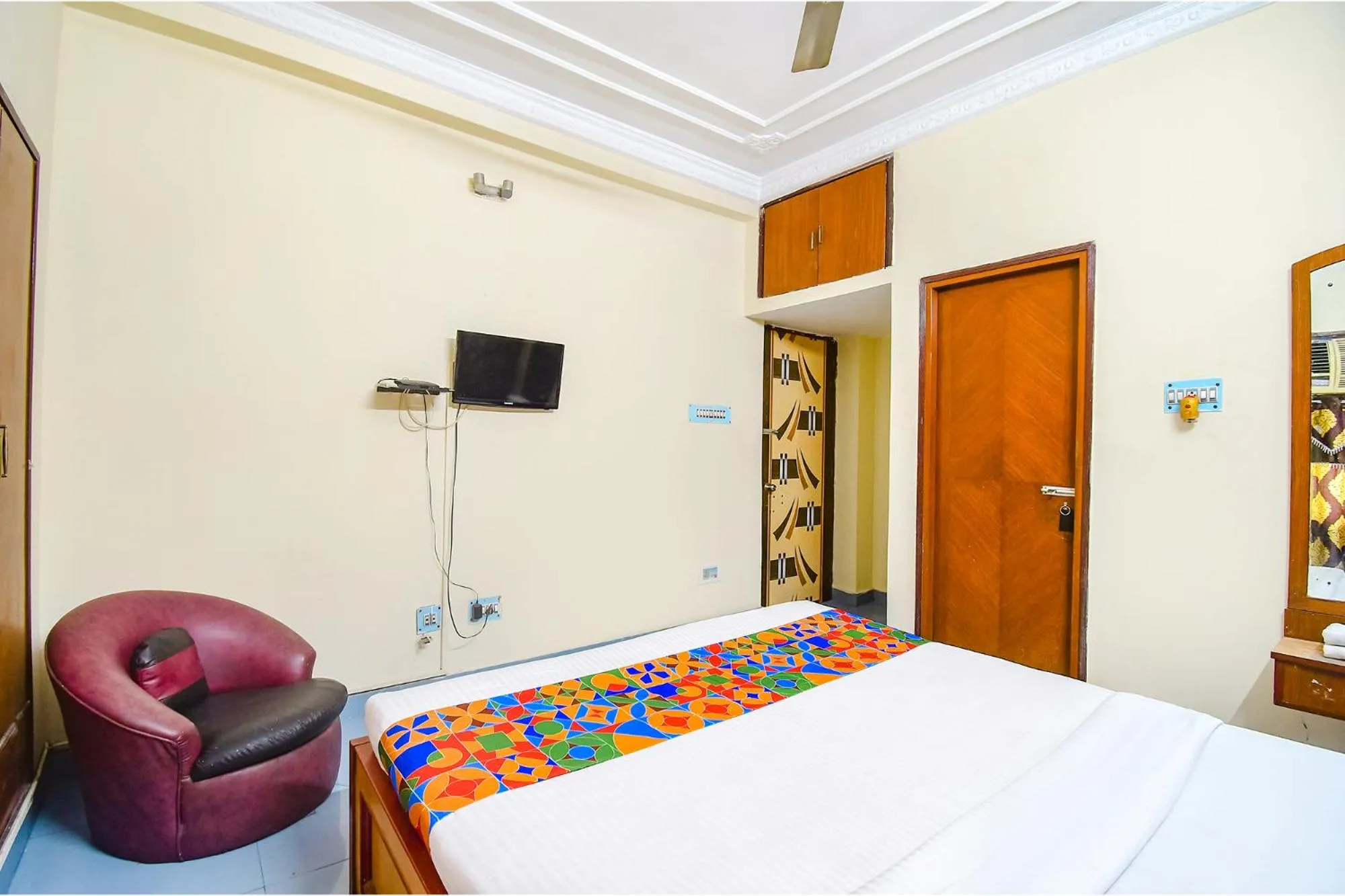 Bed in FabHotel Heritage Inn