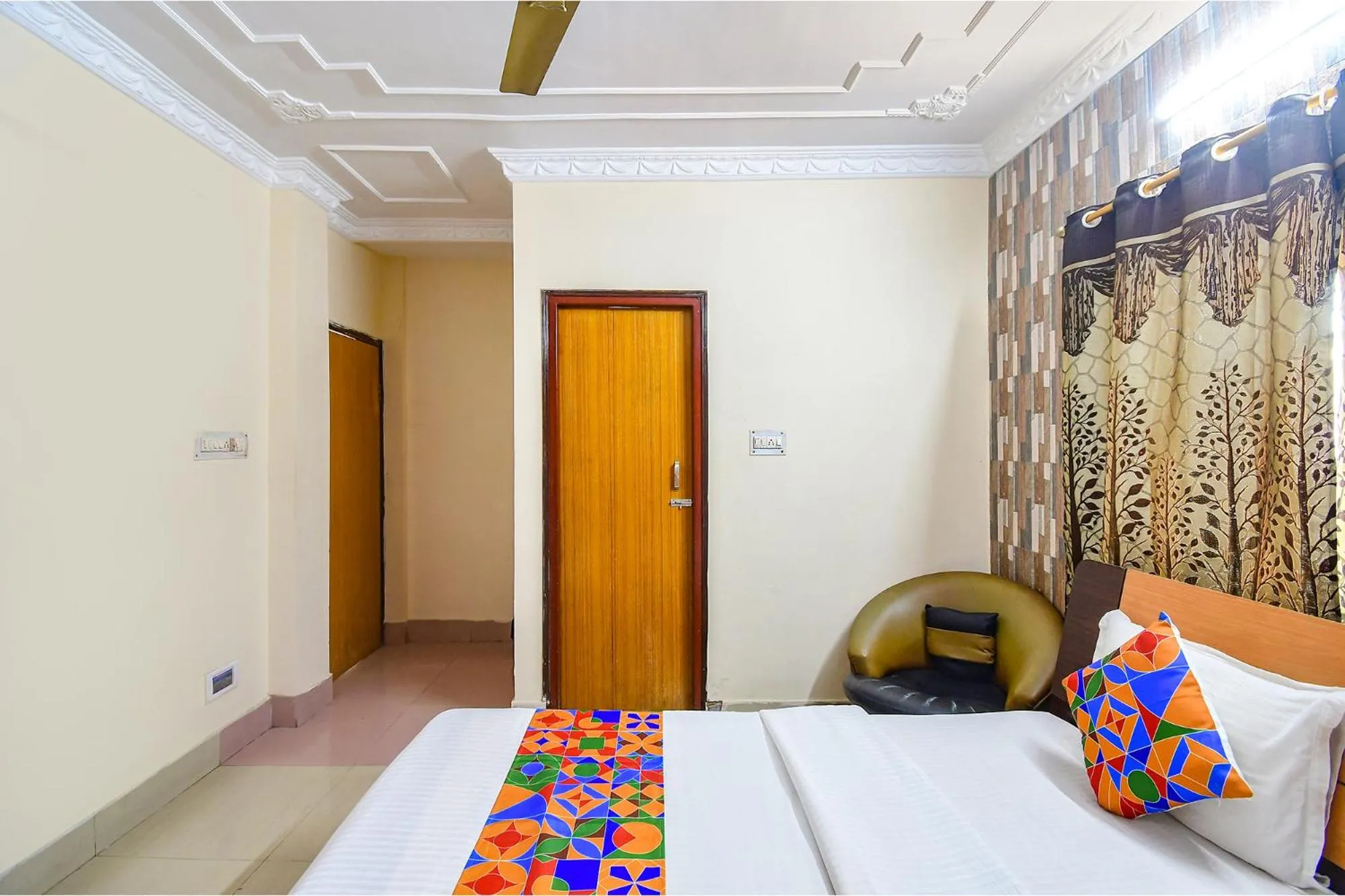 Bed in FabHotel Heritage Inn