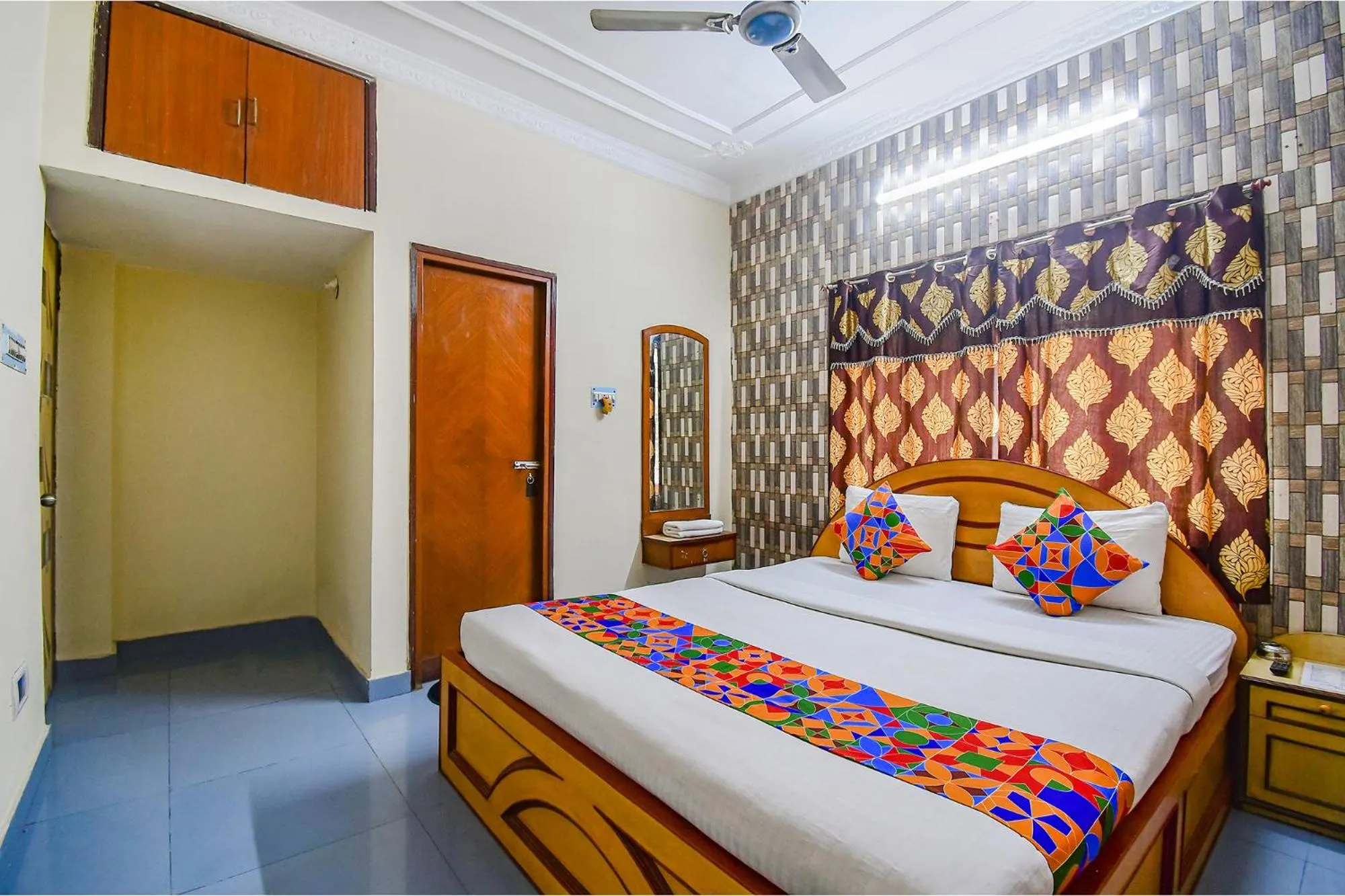 Bed in FabHotel Heritage Inn