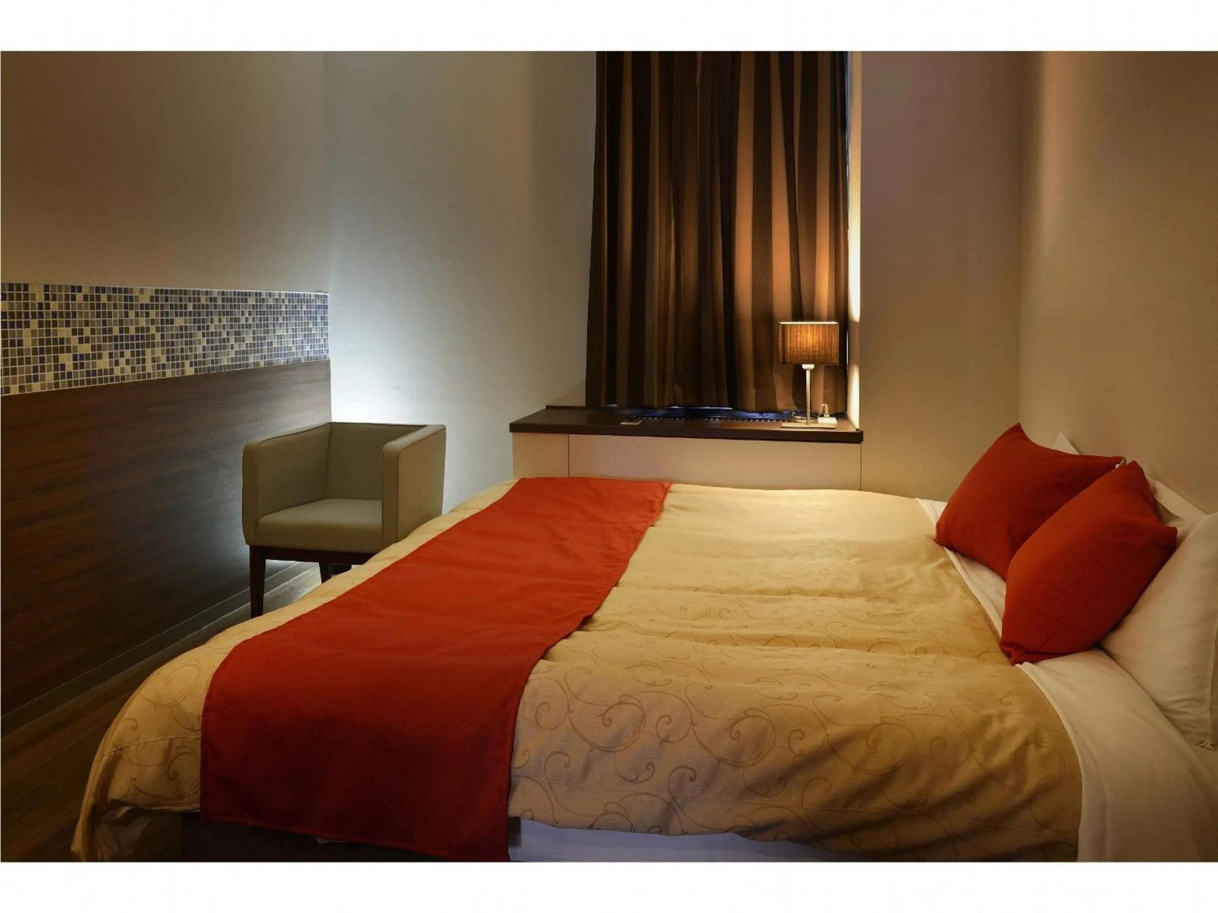 Bed in Hotel Seiryu Japanese Spa inn with spectacular view in Osaka