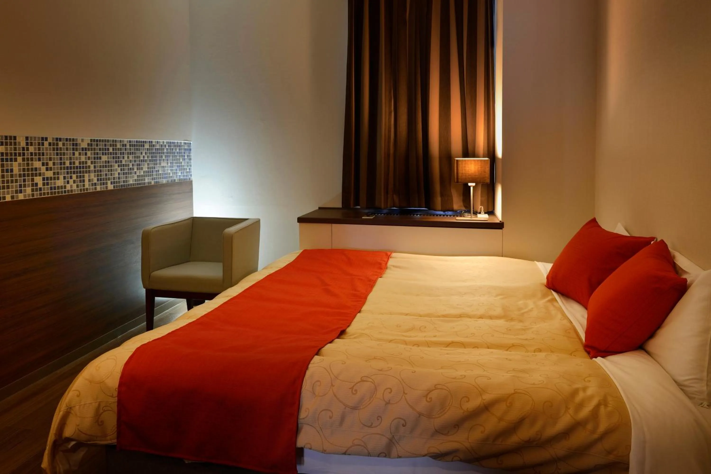 Bed in Hotel Seiryu Japanese Spa inn with spectacular view in Osaka