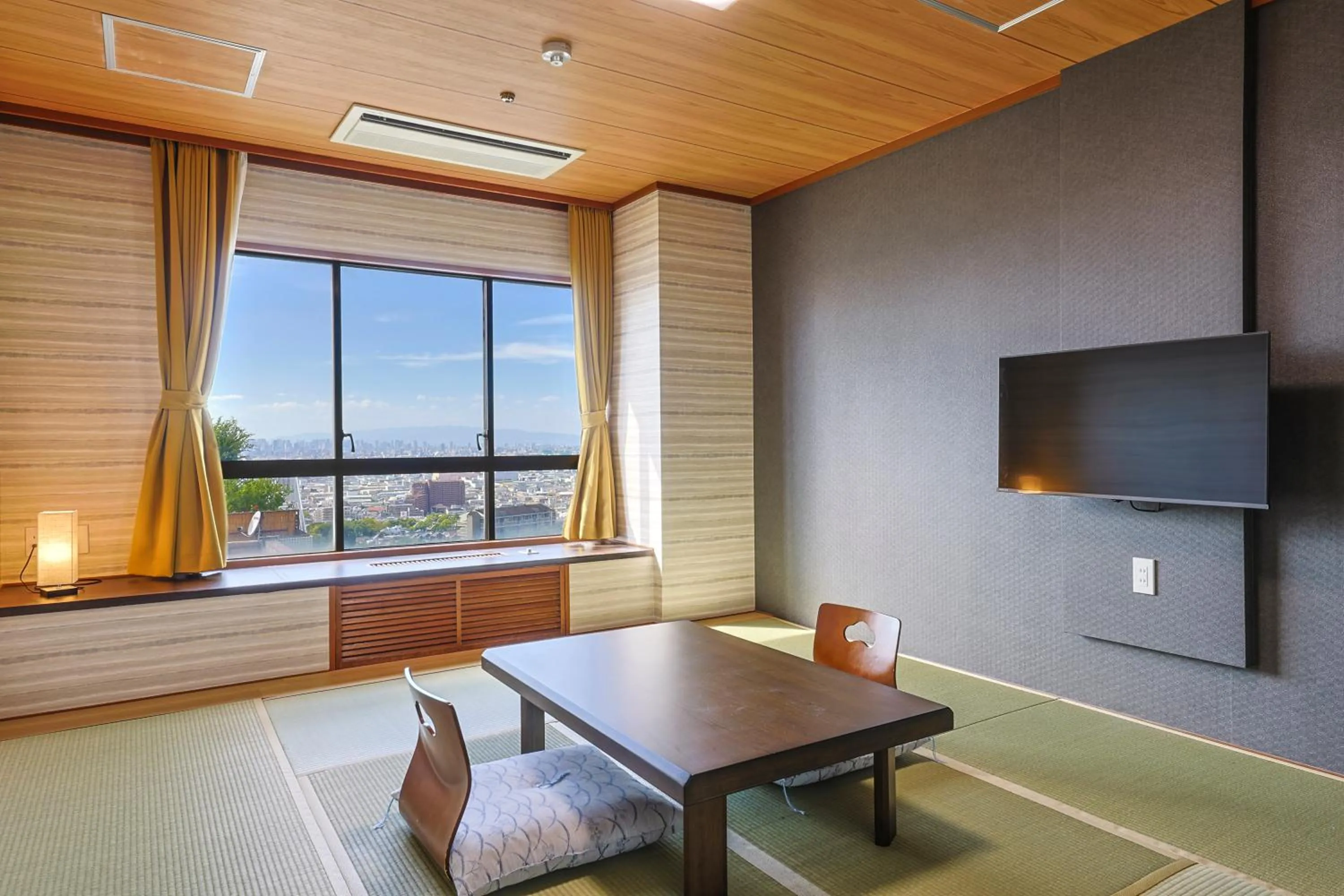 Living room in Hotel Seiryu Japanese Spa inn with spectacular view in Osaka