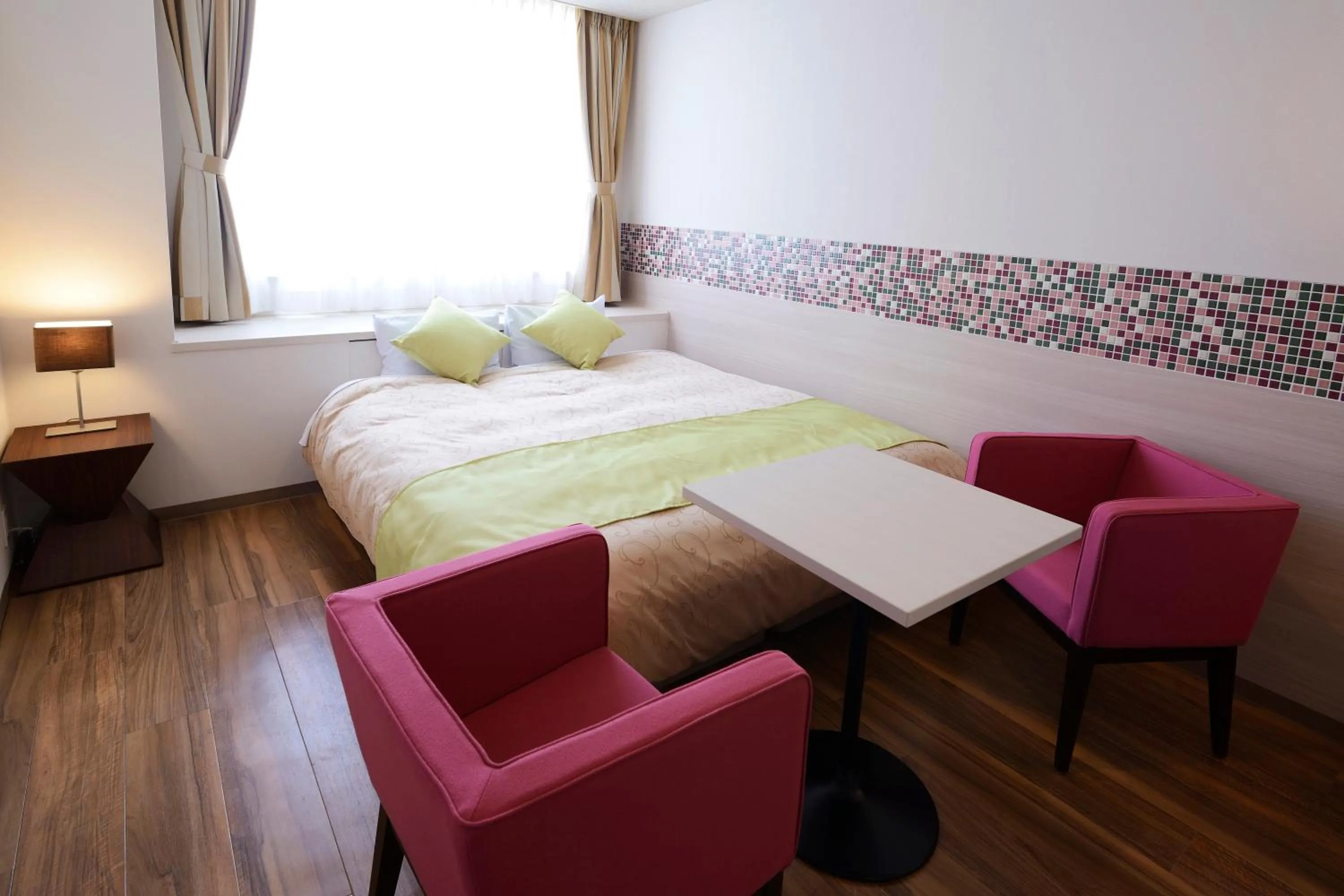 Bed in Hotel Seiryu Japanese Spa inn with spectacular view in Osaka