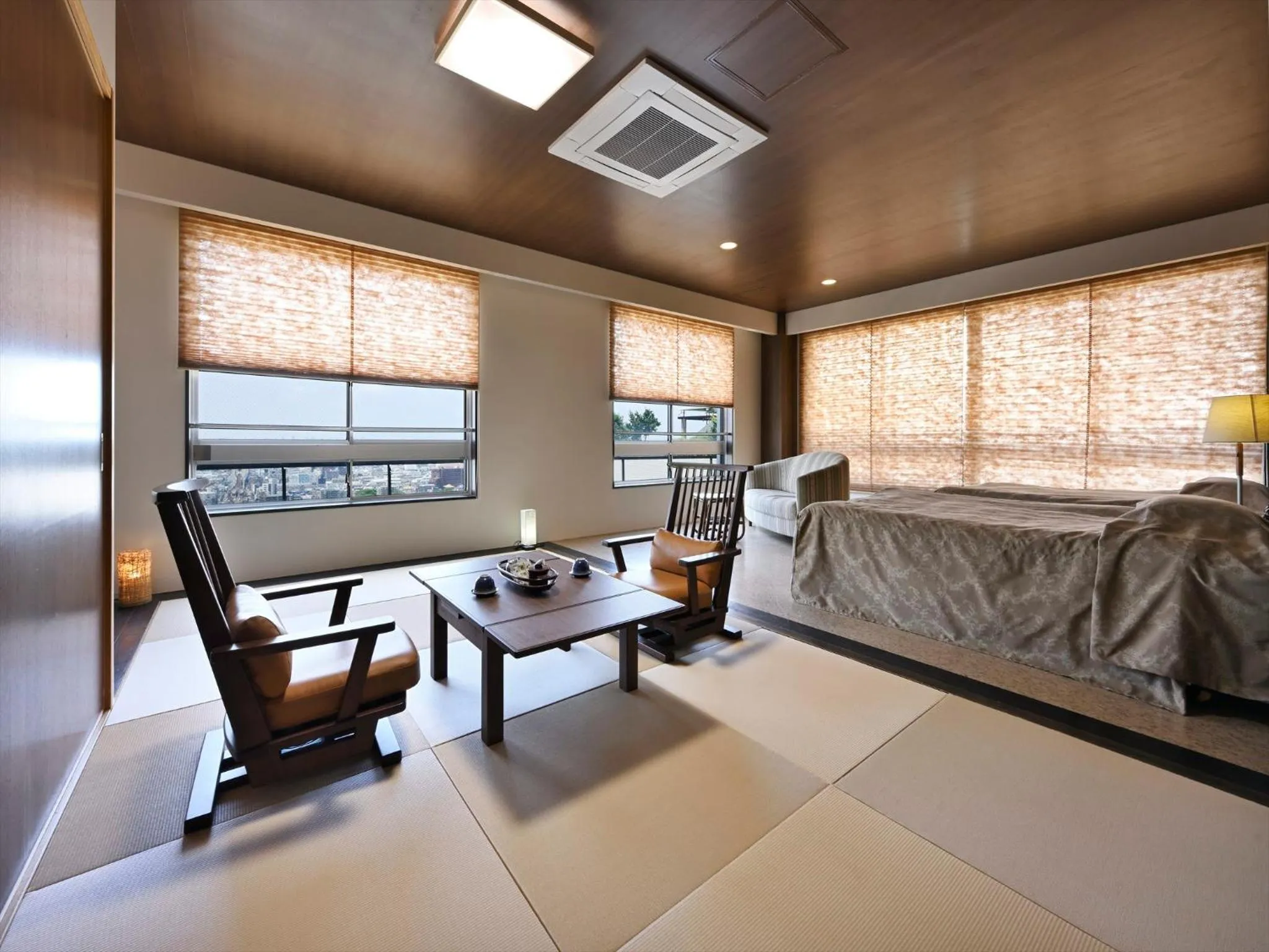 Bed in Hotel Seiryu Japanese Spa inn with spectacular view in Osaka