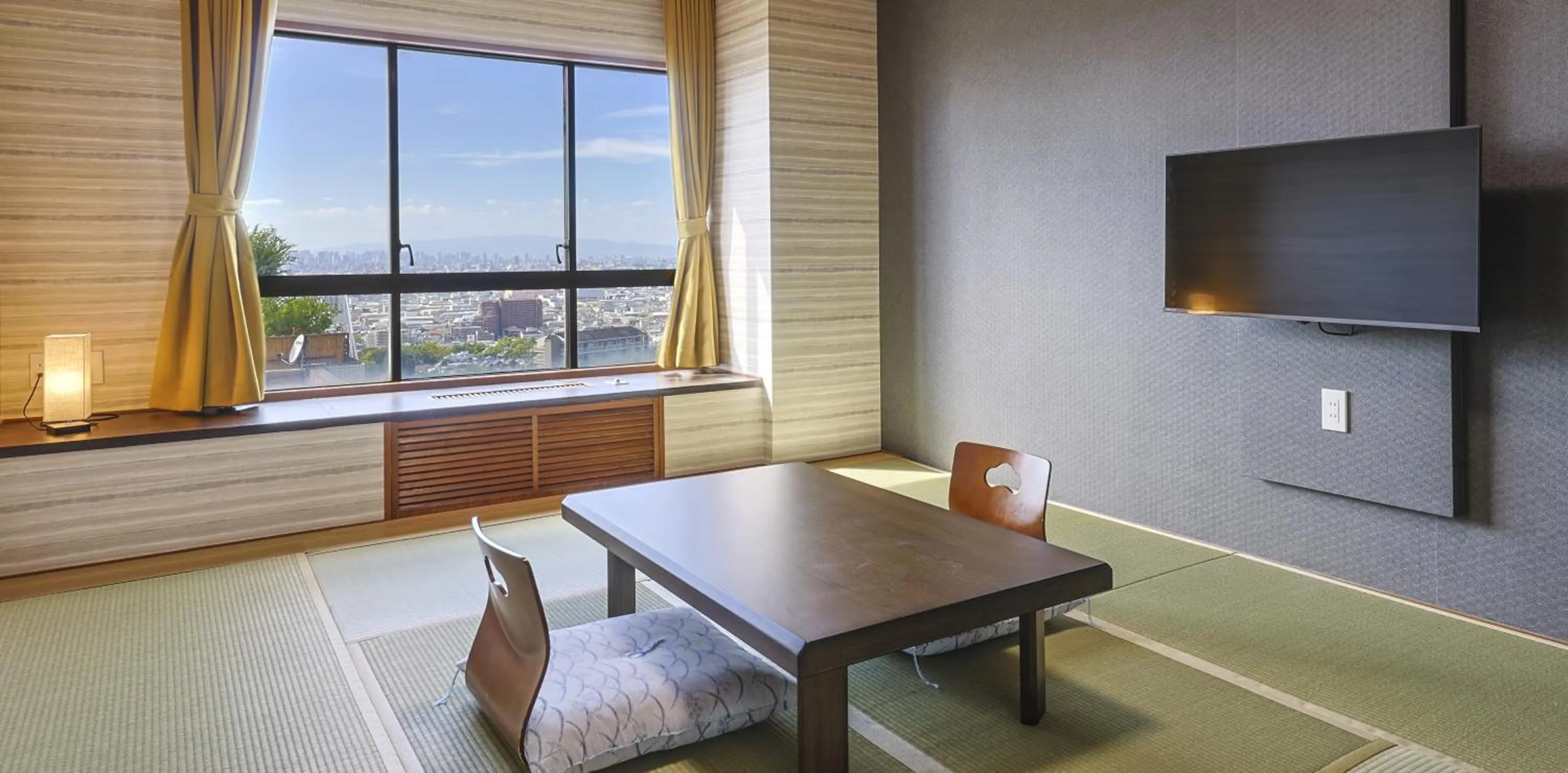 Living room in Hotel Seiryu Japanese Spa inn with spectacular view in Osaka