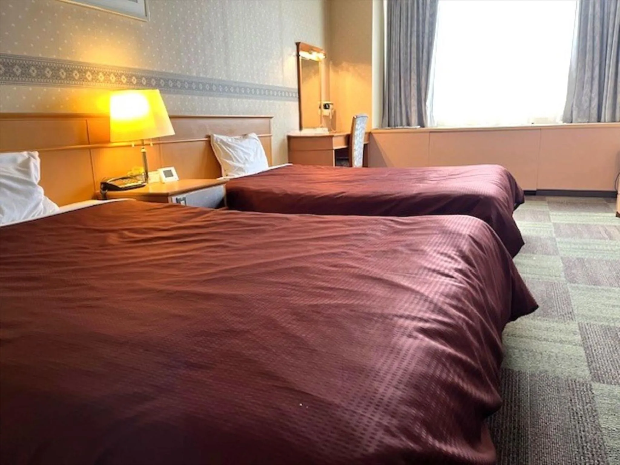 Bed in Hotel Seiryu Japanese Spa inn with spectacular view in Osaka