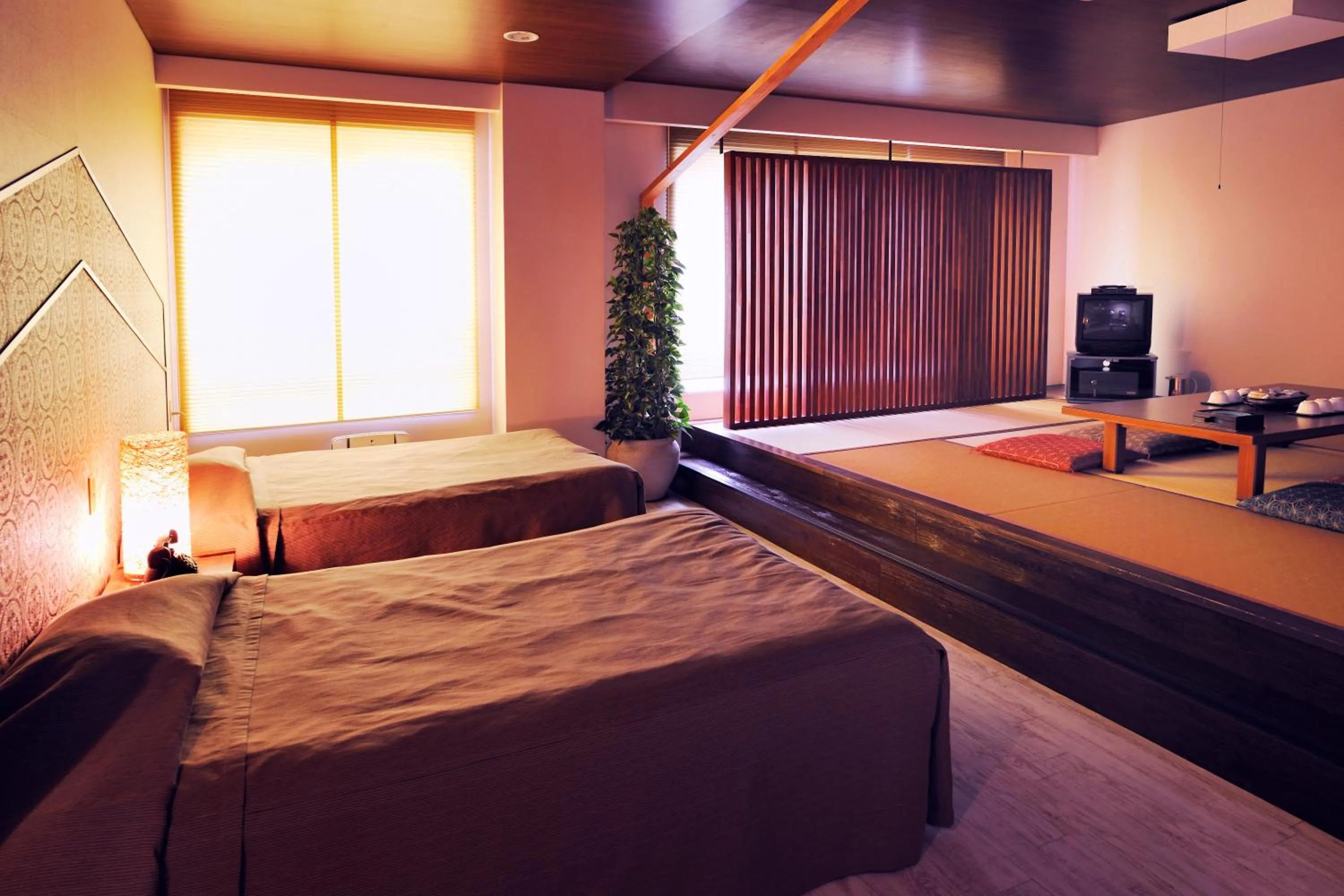 Bedroom, Bed in Hotel Seiryu Japanese Spa inn with spectacular view in Osaka
