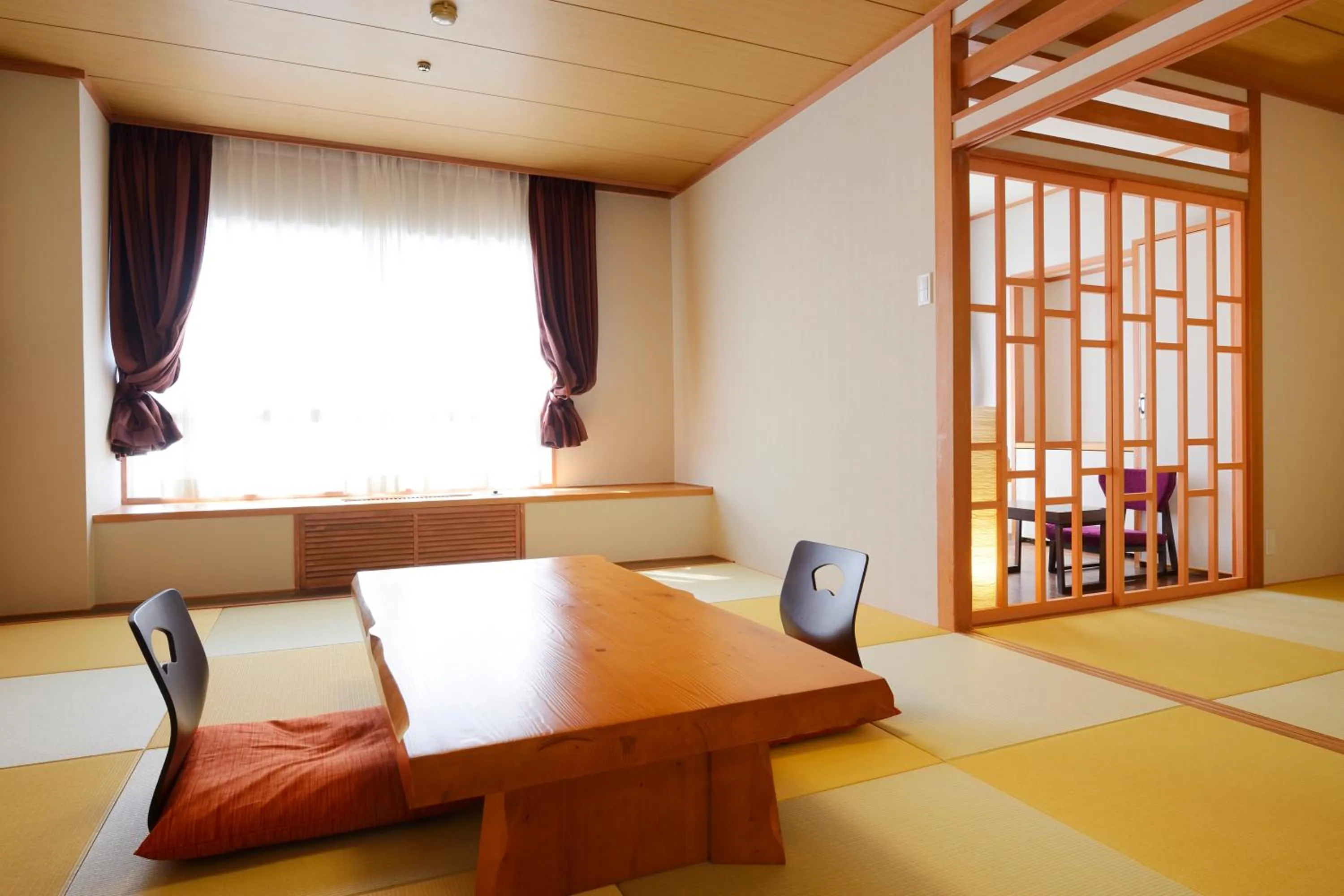 Living room, Bed in Hotel Seiryu Japanese Spa inn with spectacular view in Osaka