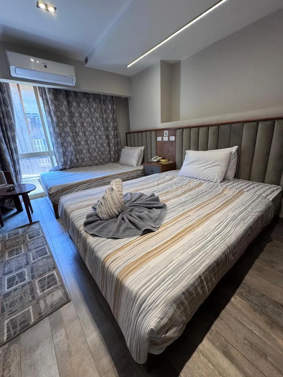 Bed in Garden City Plaza Hotel