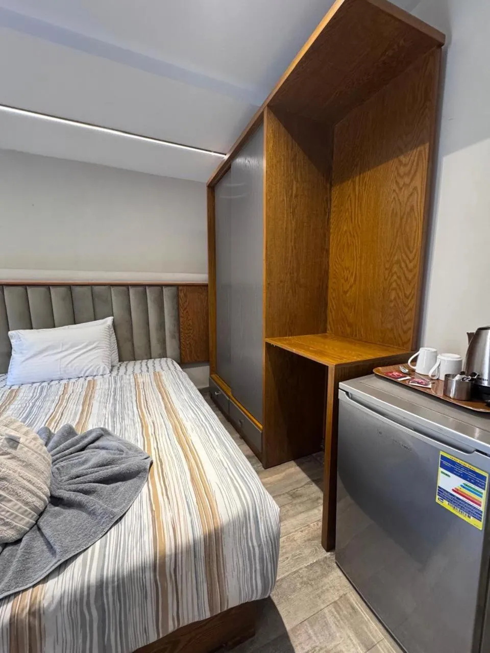 Bed in Garden City Plaza Hotel