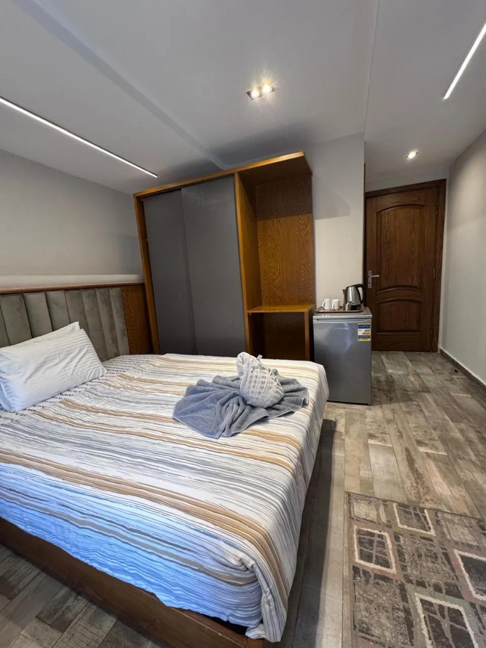 Bed in Garden City Plaza Hotel