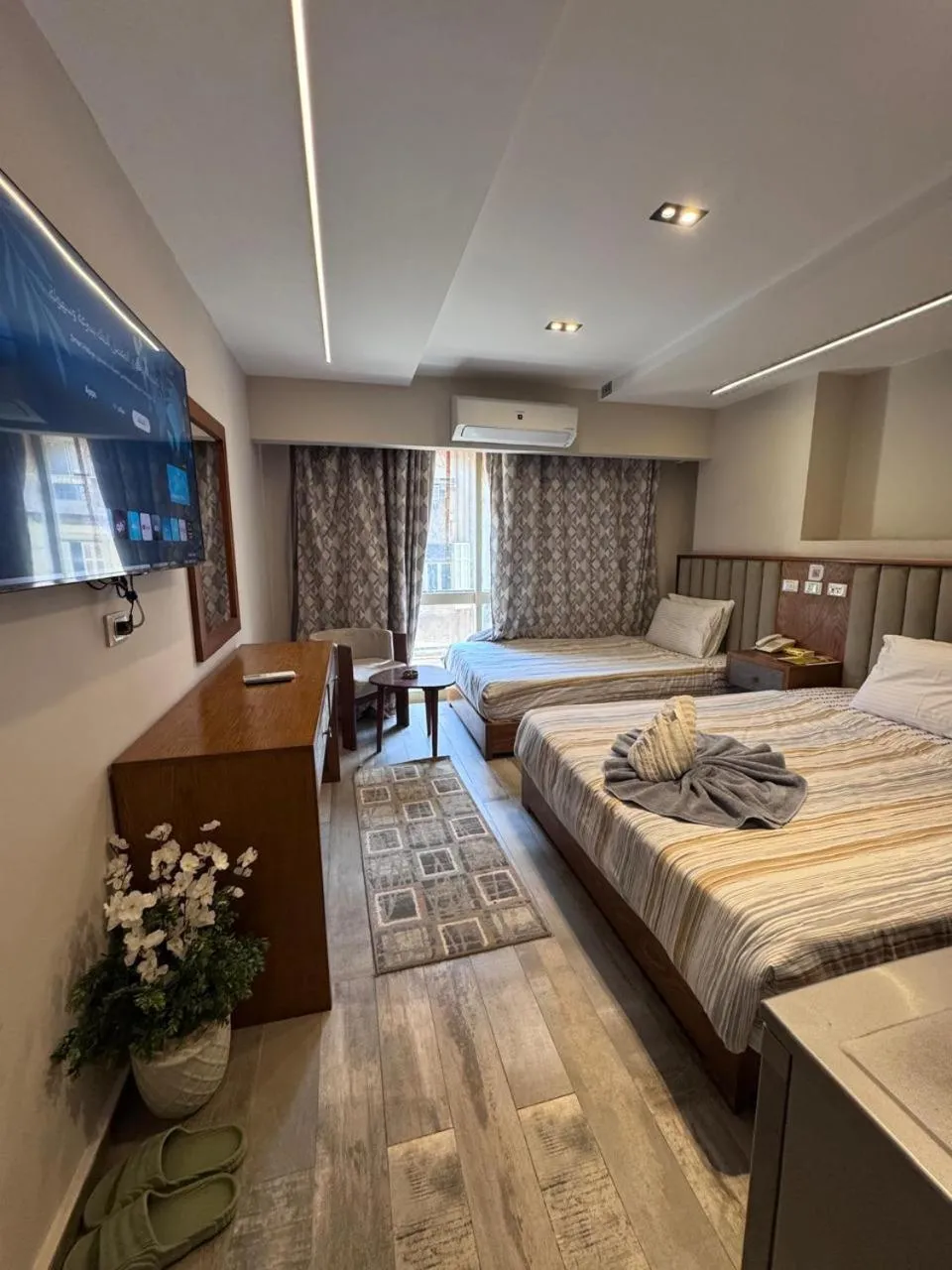 Bed in Garden City Plaza Hotel