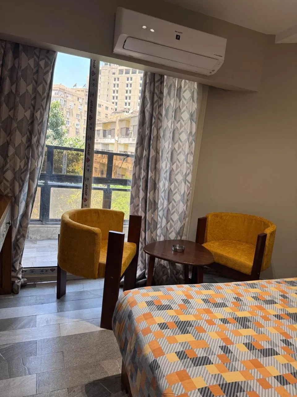 Bed in Garden City Plaza Hotel