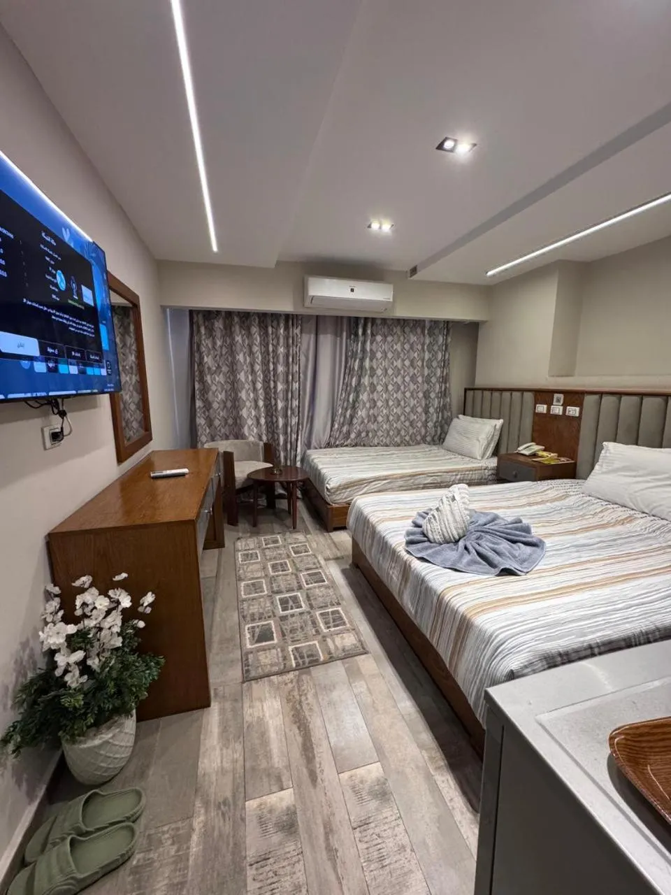 Bed in Garden City Plaza Hotel