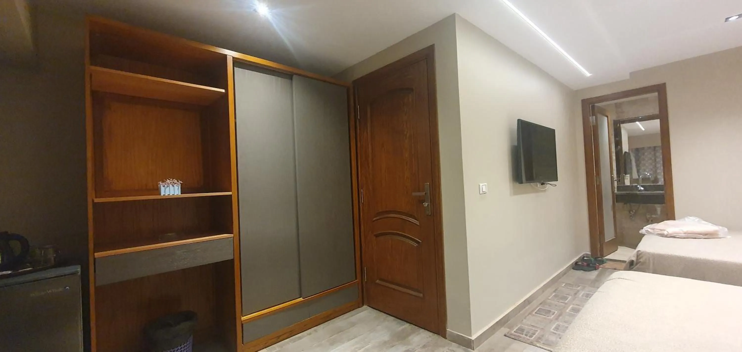 Bed in Garden City Plaza Hotel