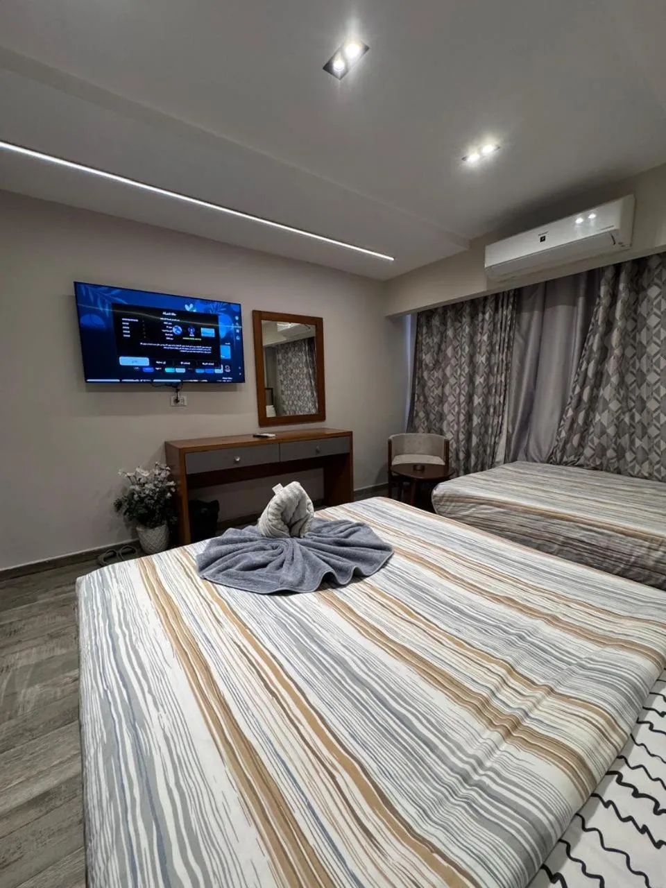 Bed in Garden City Plaza Hotel