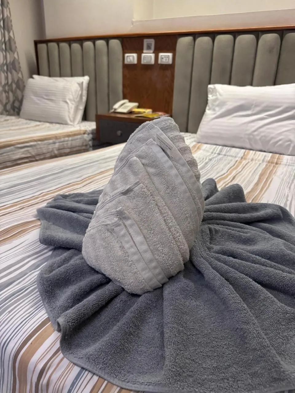 Bed in Garden City Plaza Hotel