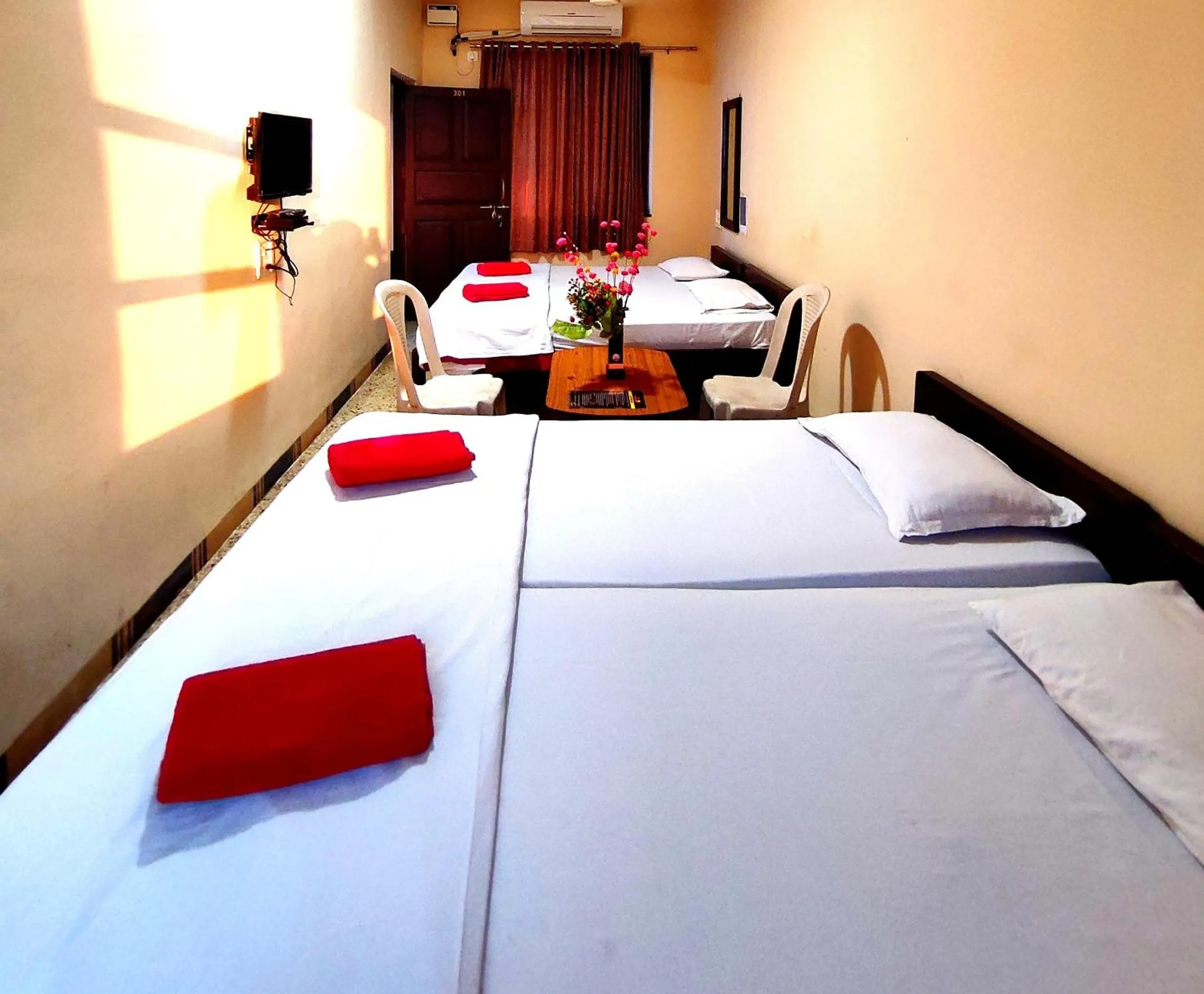 Bed in Mandarin Hotel Mapusa