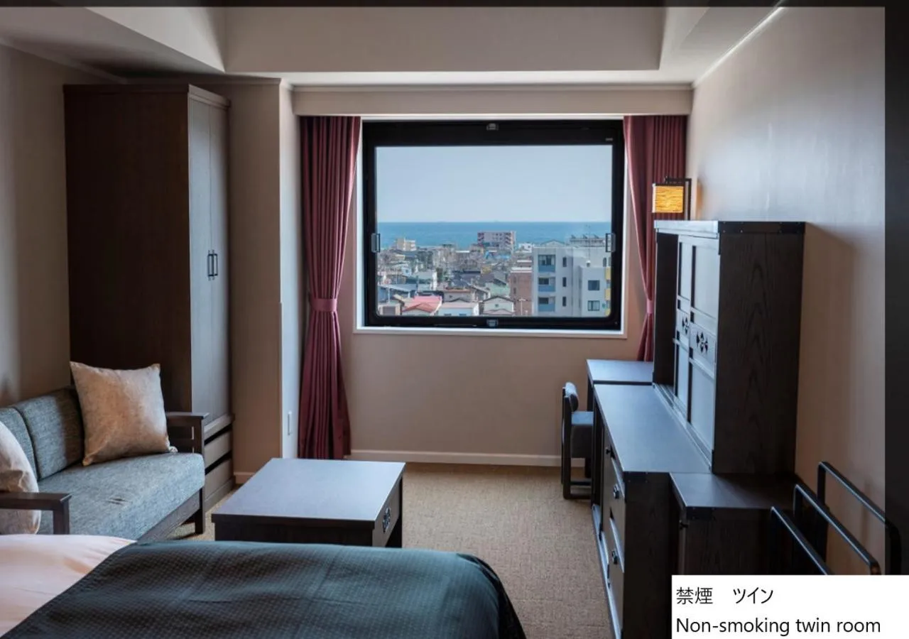 Communal lounge/ TV room, Bed in La Vista Hakodate Bay Annex