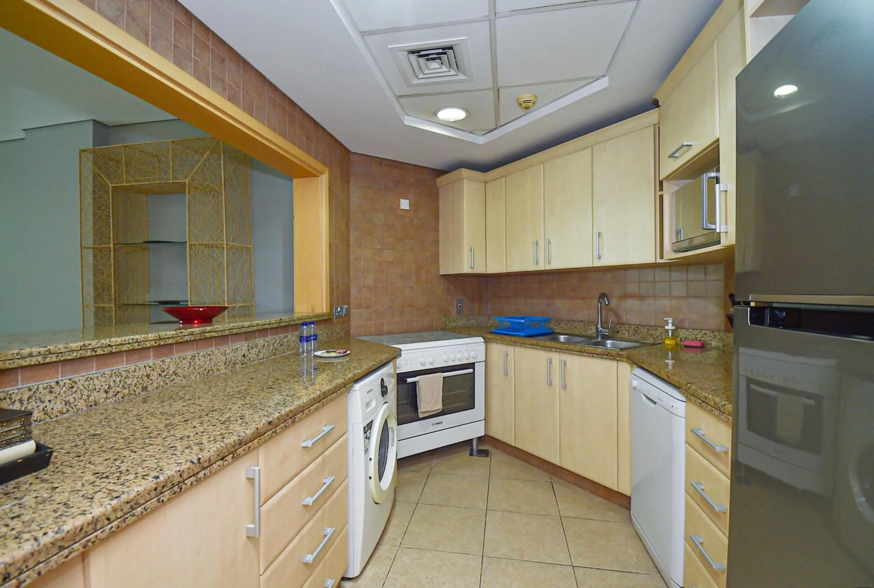 Kitchen or kitchenette in Luxury Escapes - Palm Jumeirah's Spectacular Ocean-View Apartment - NABAT