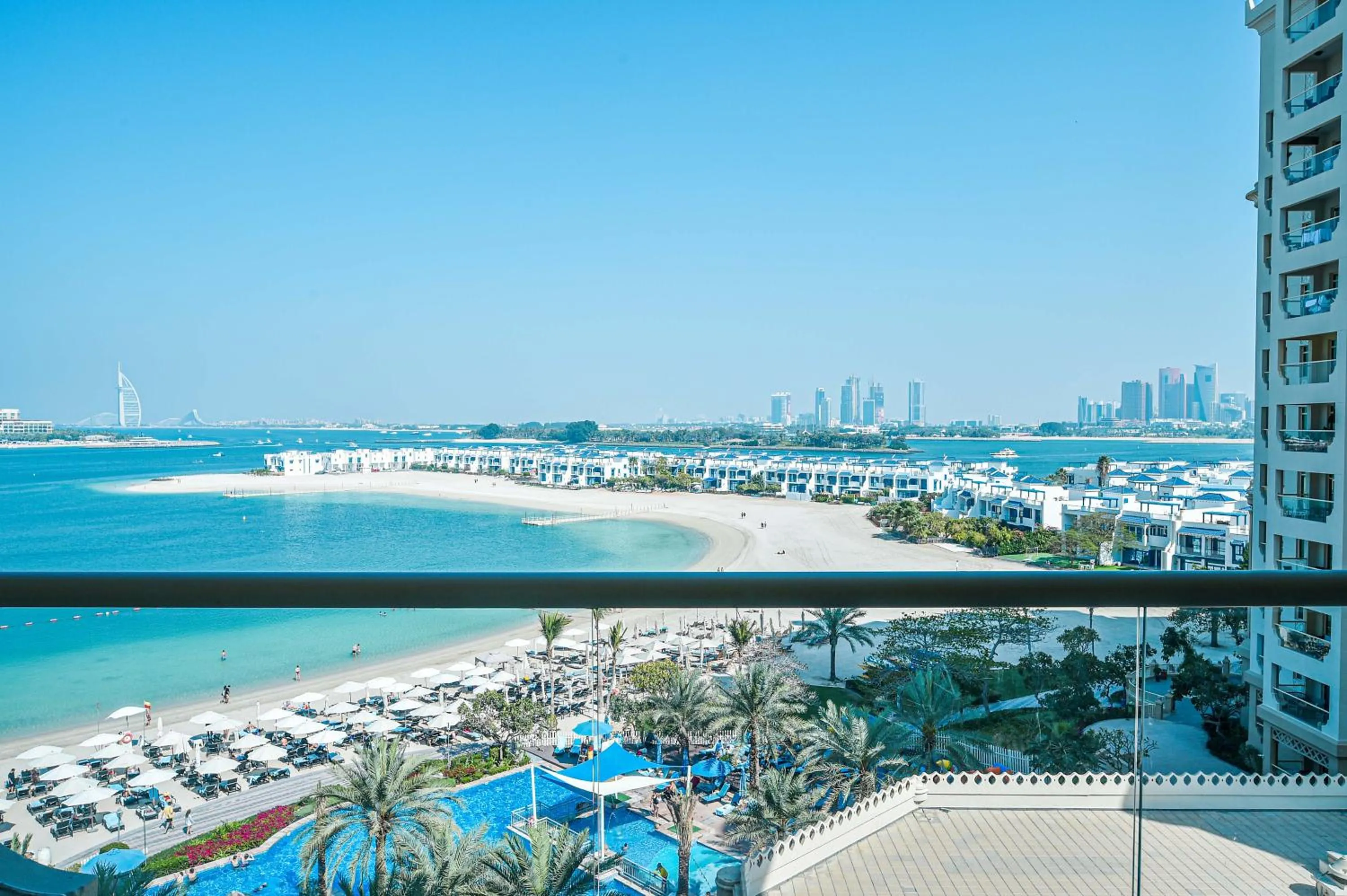 Property building in Luxury Escapes - Palm Jumeirah's Spectacular Ocean-View Apartment - NABAT