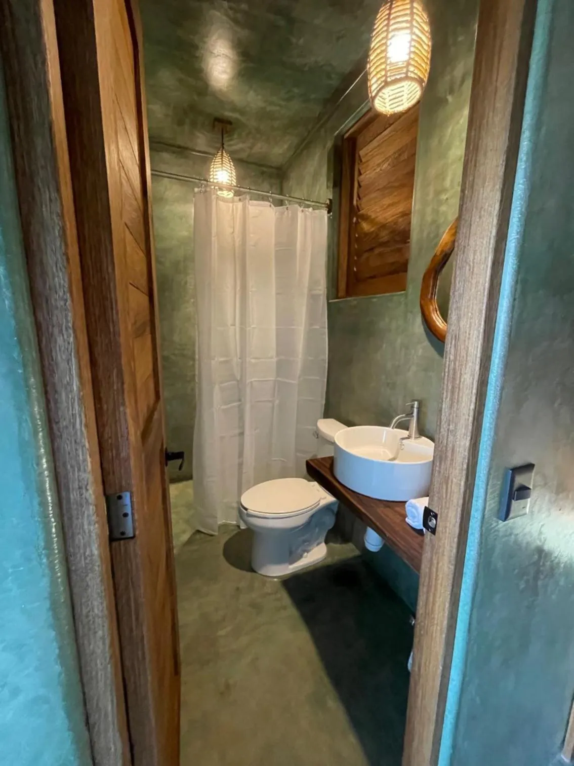 Shower in COCOS HOTEL