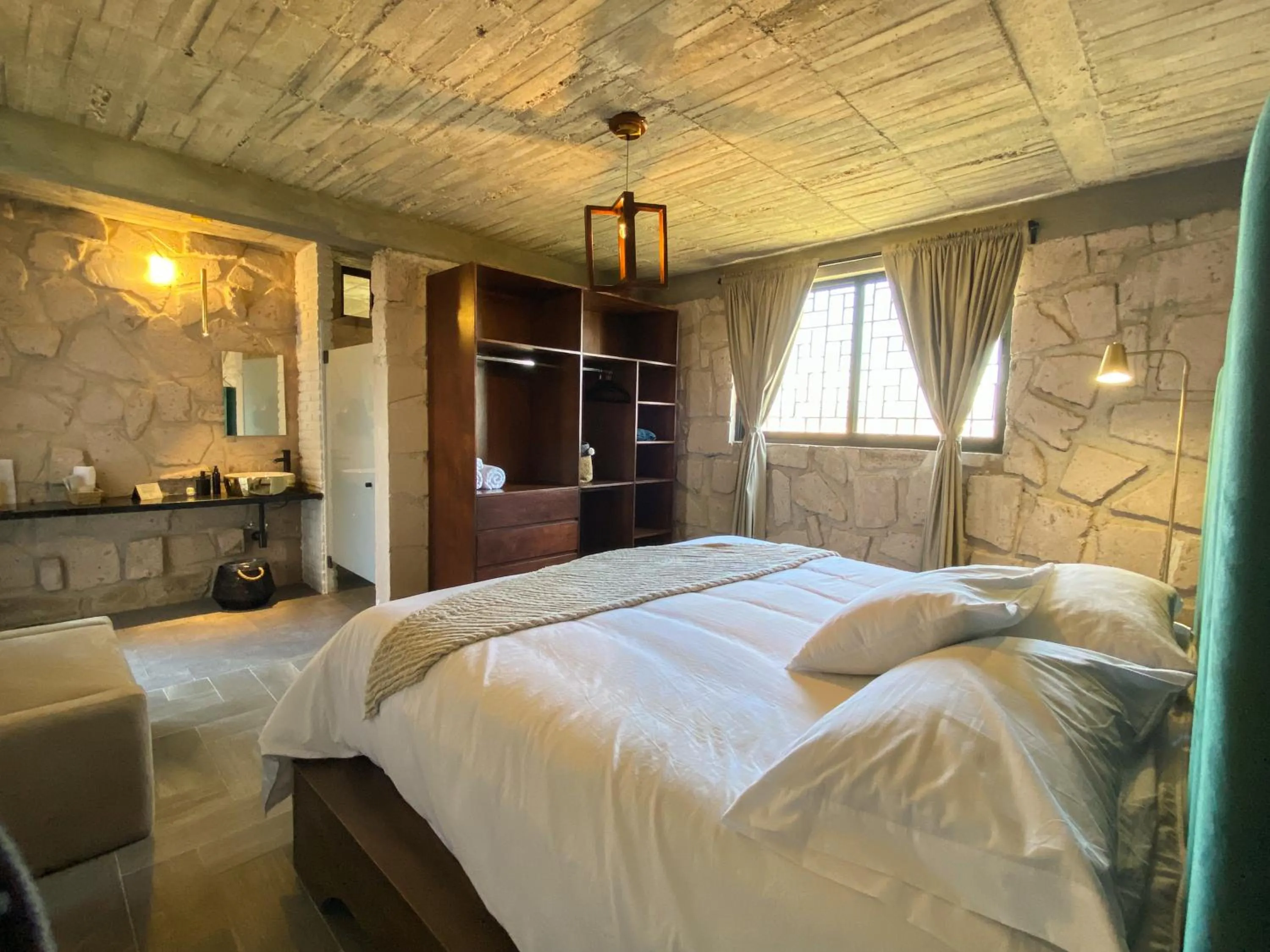 Photo of the whole room, Bed in Dos Aguas Hotel Boutique