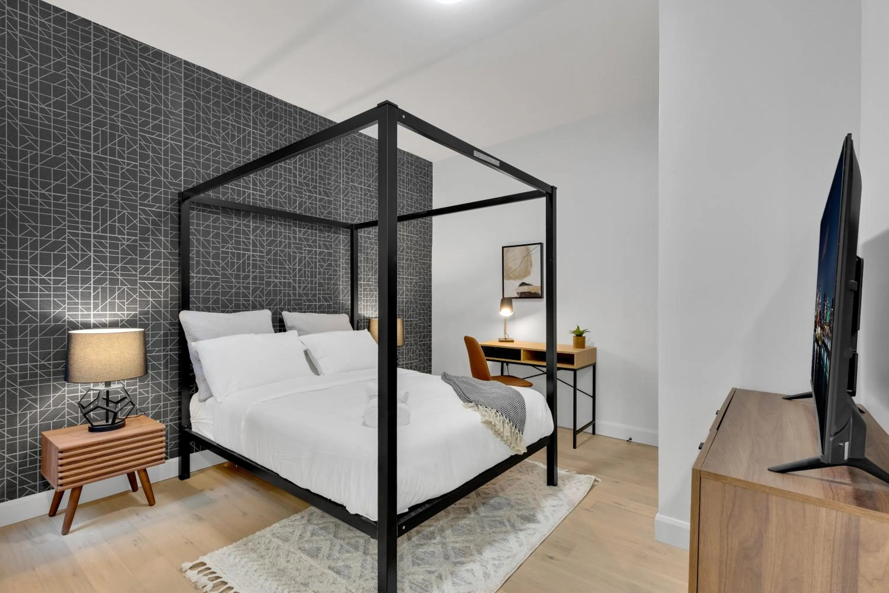 Bed in Deluxe Suites Downtown Montreal