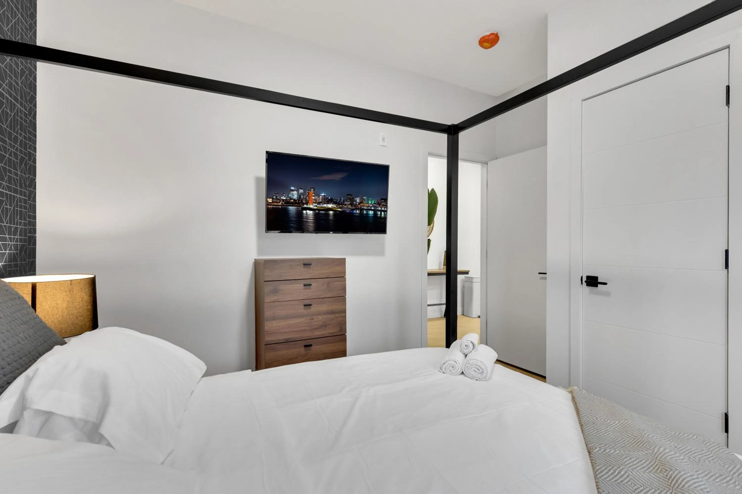 Bed in Deluxe Suites Downtown Montreal