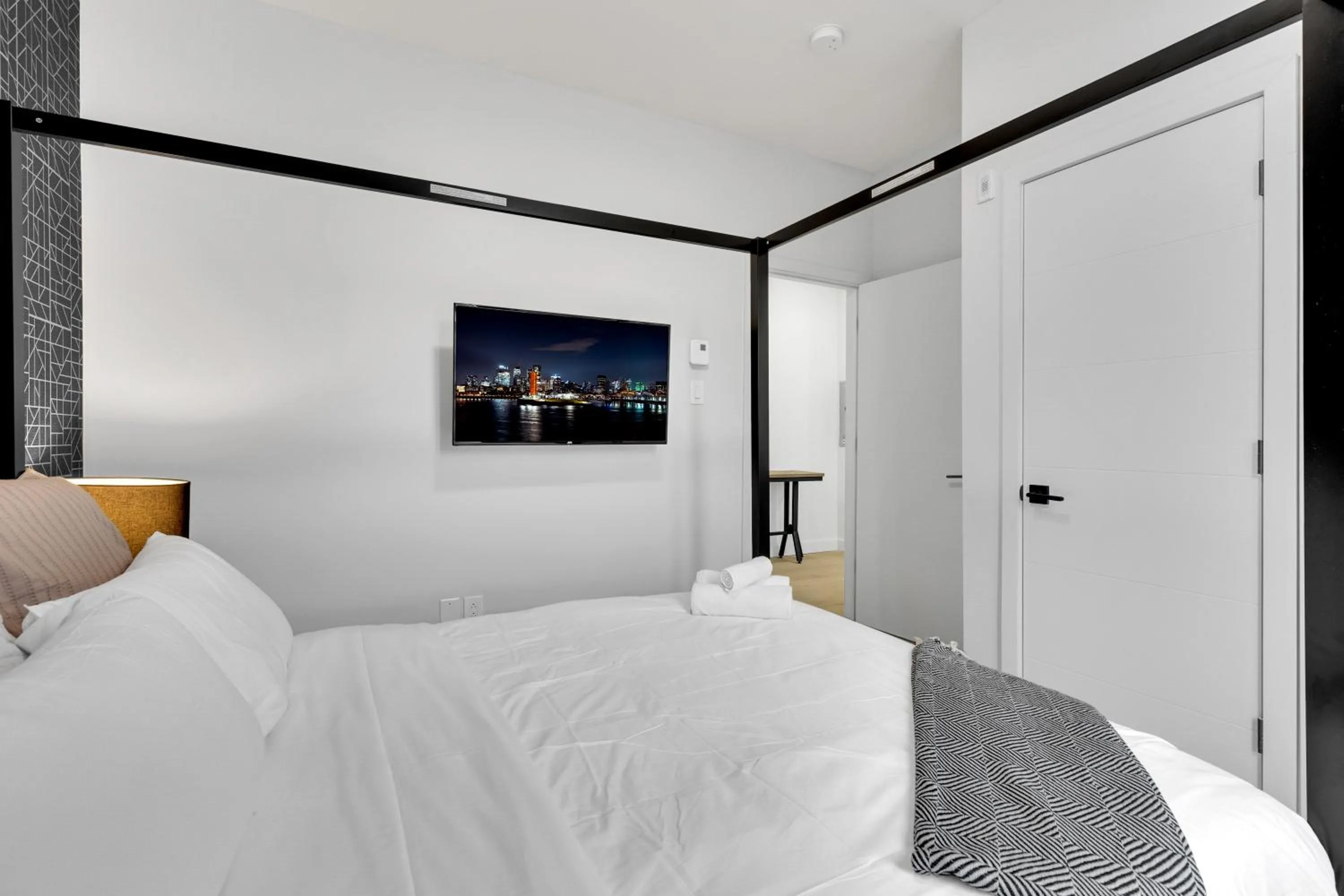 Bed in Deluxe Suites Downtown Montreal