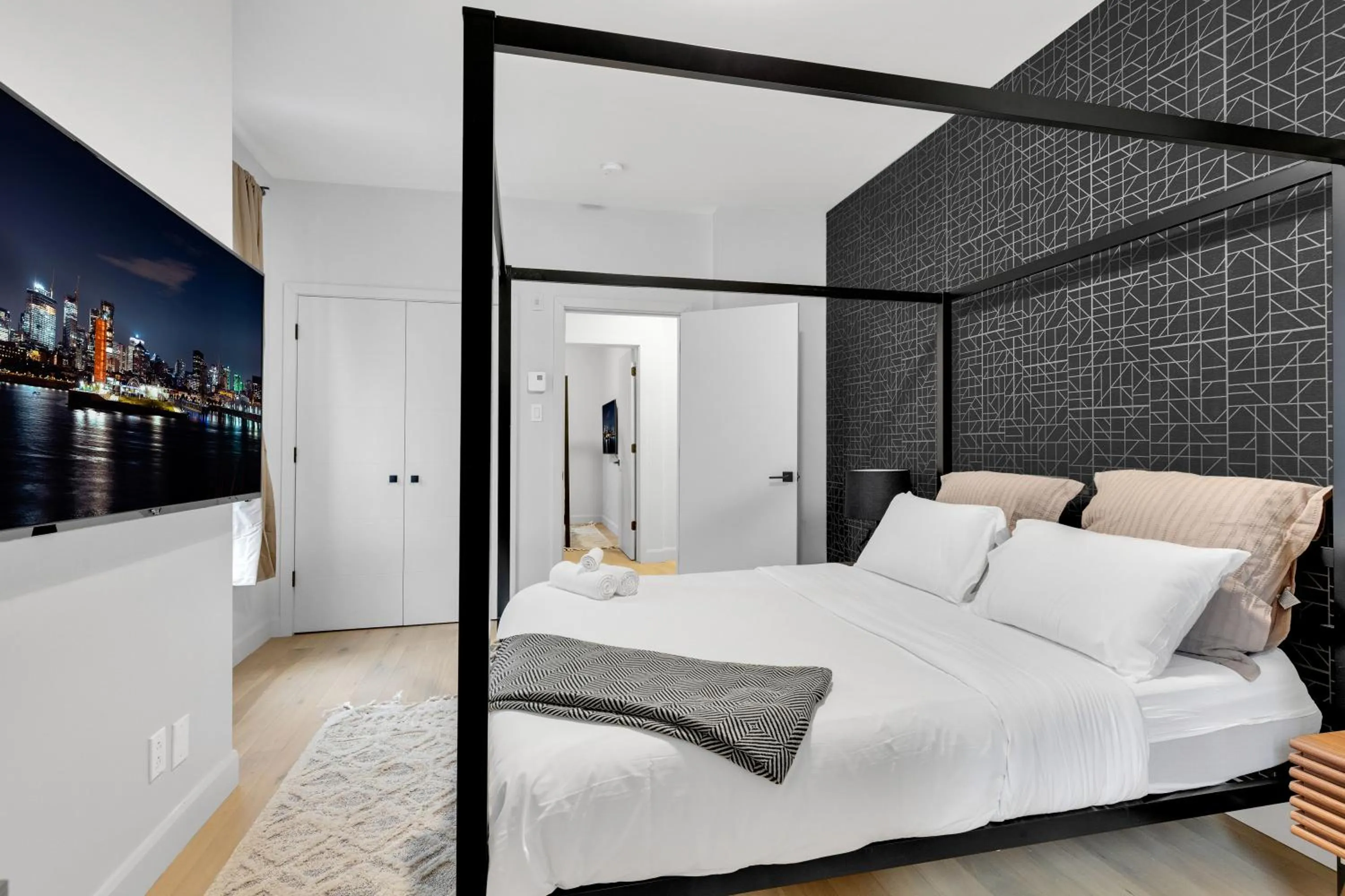 Bed in Deluxe Suites Downtown Montreal