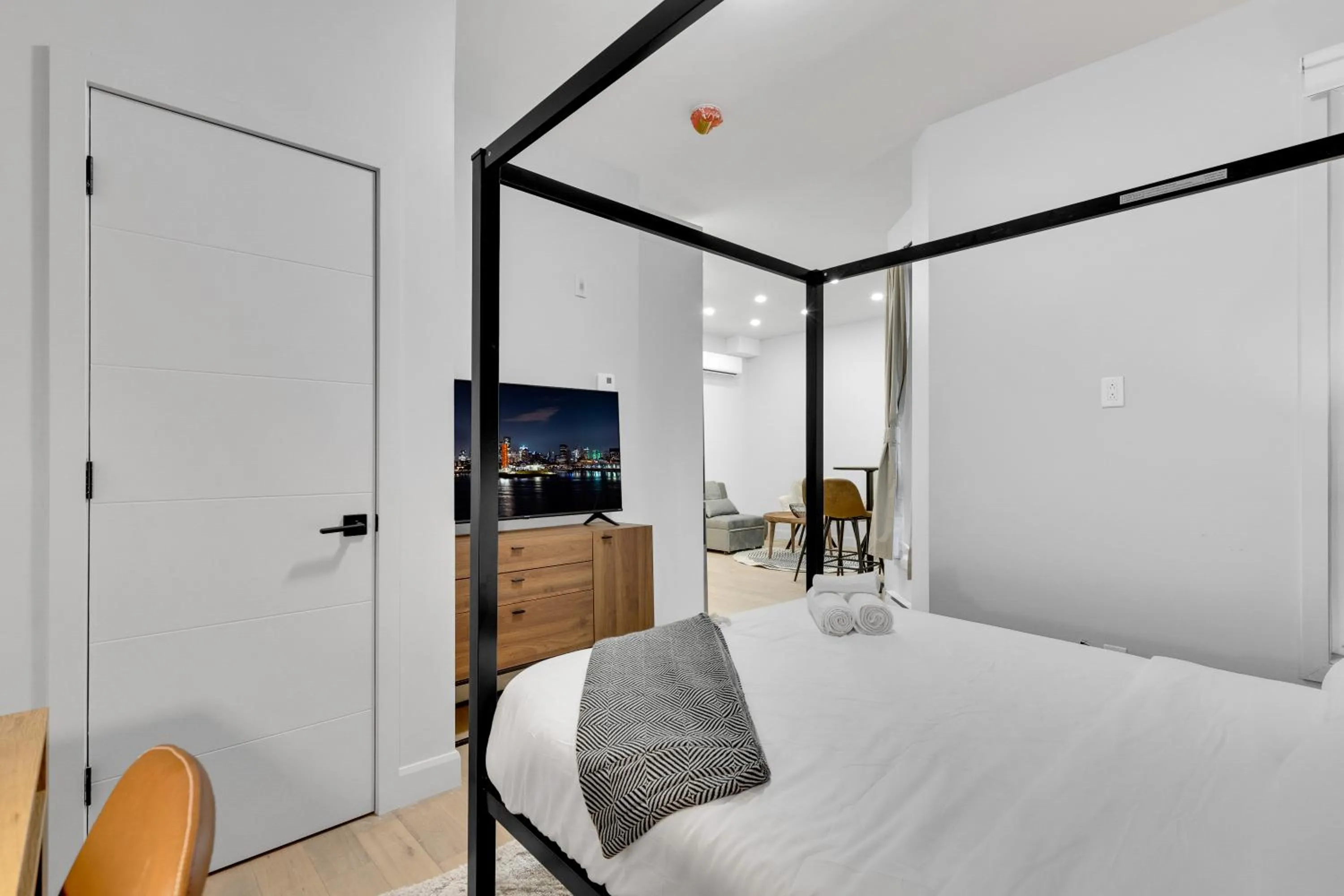 Bed in Deluxe Suites Downtown Montreal