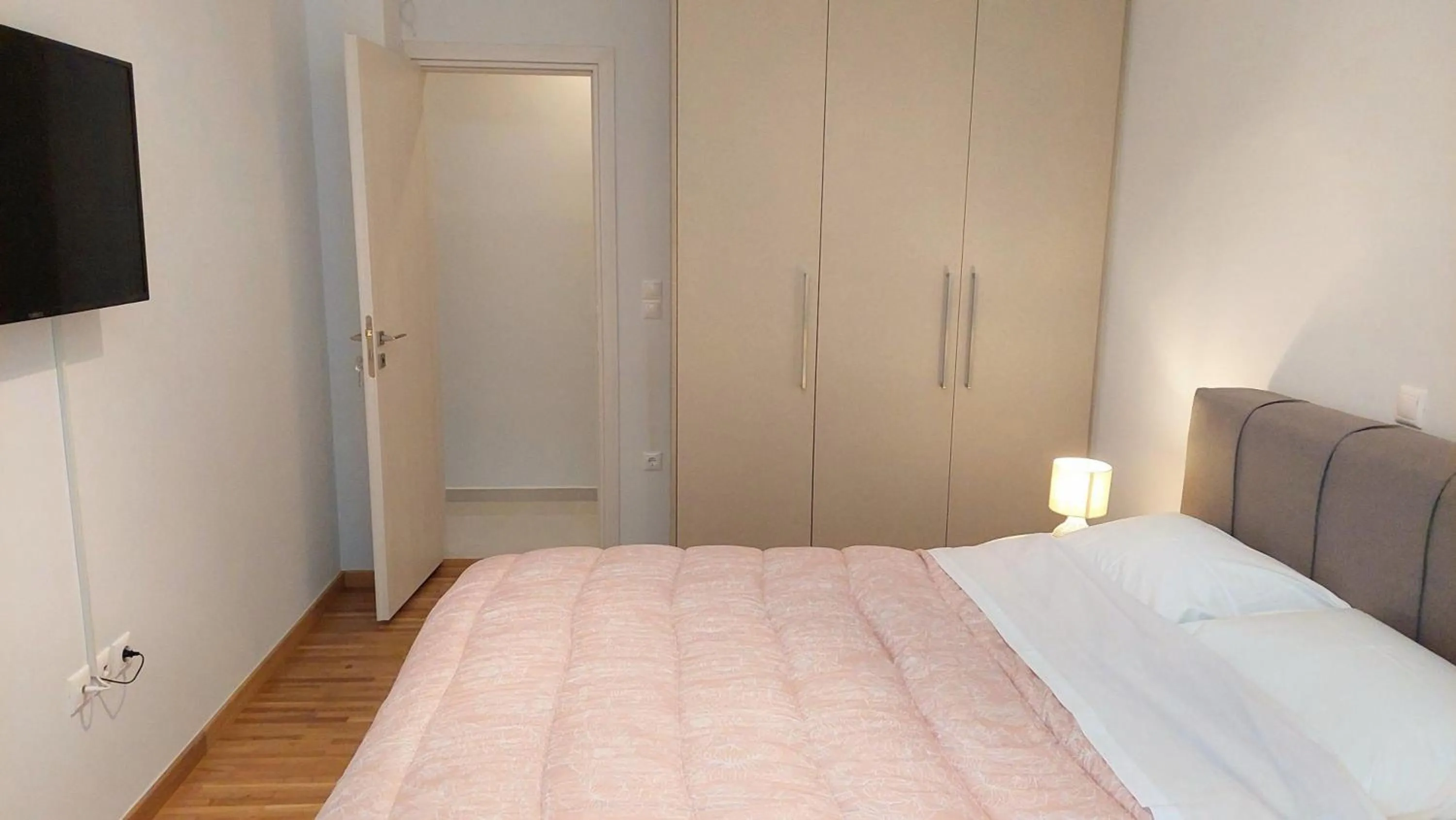 Bed in Wonderful apartment in Acropolis