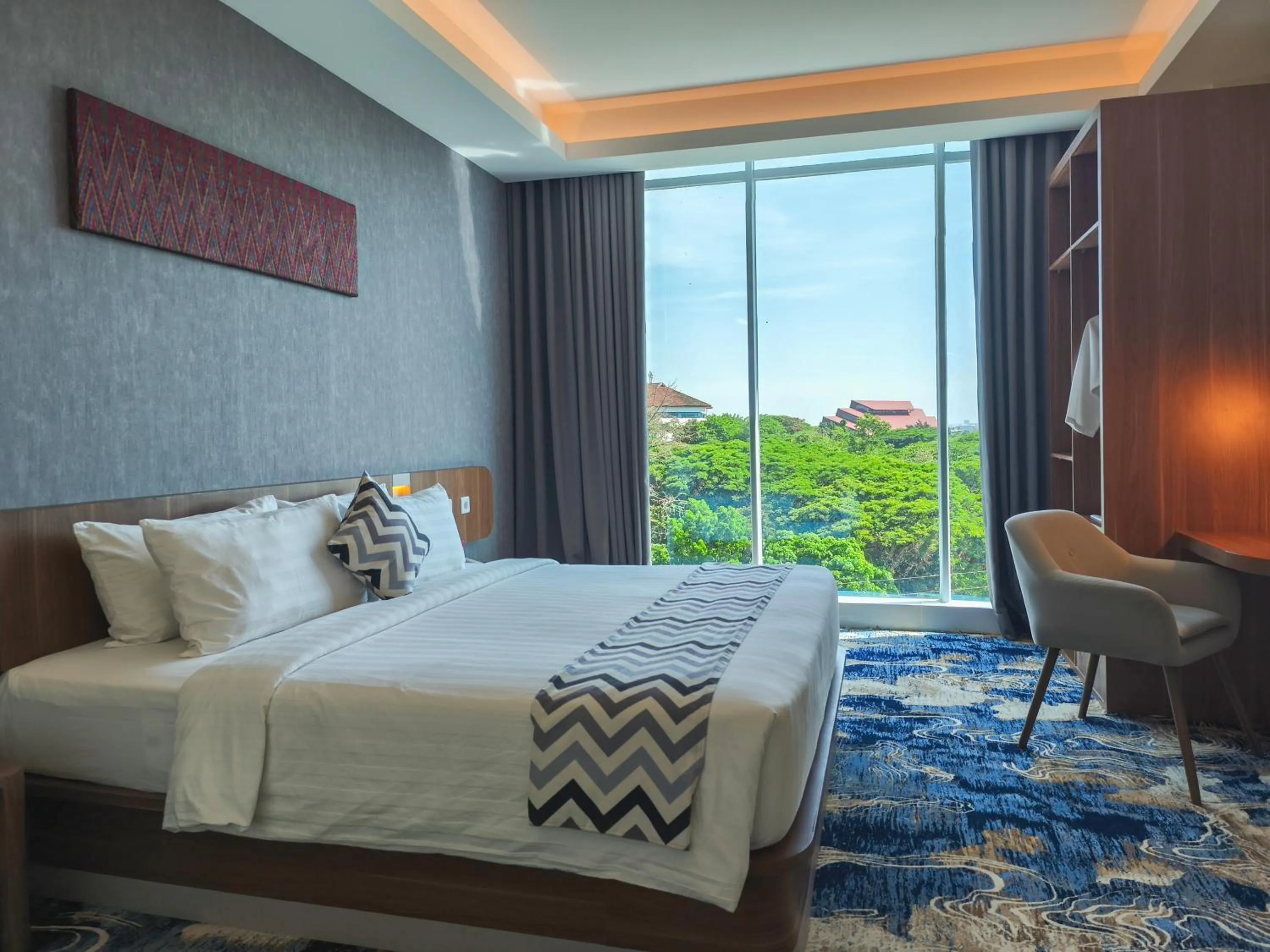 Bed in UNHAS HOTEL & CONVENTION