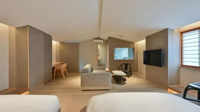 Bed in Ureshino Onsen Yusyuku Sarayama Bed in Ureshino Onsen Yusyuku Sarayama