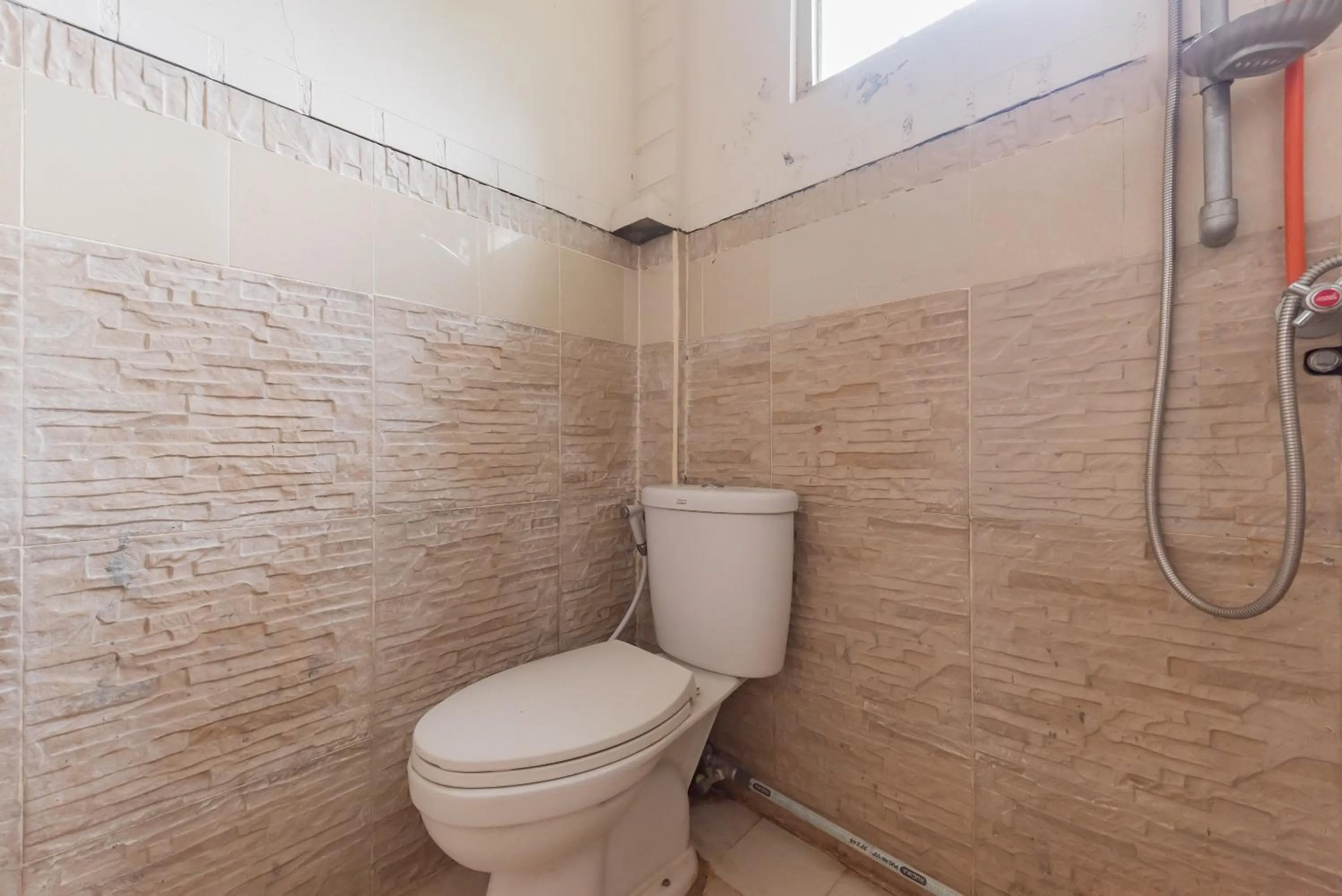 Bathroom in Urbanview Hotel Anggrek Puncak by RedDoorz