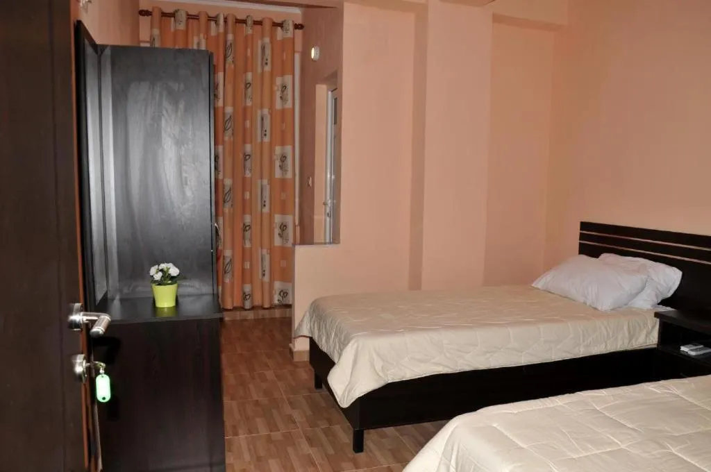 Bed in Garden Hotel