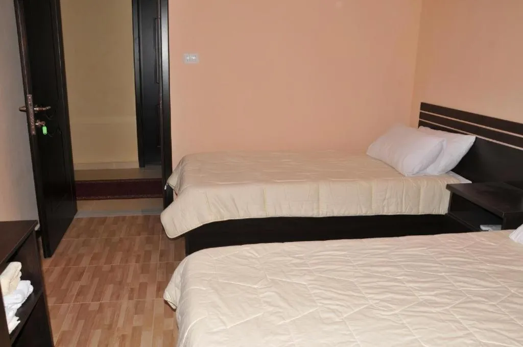 Bed in Garden Hotel