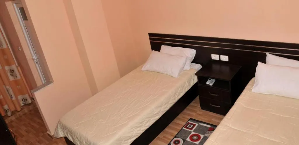 Bed in Garden Hotel