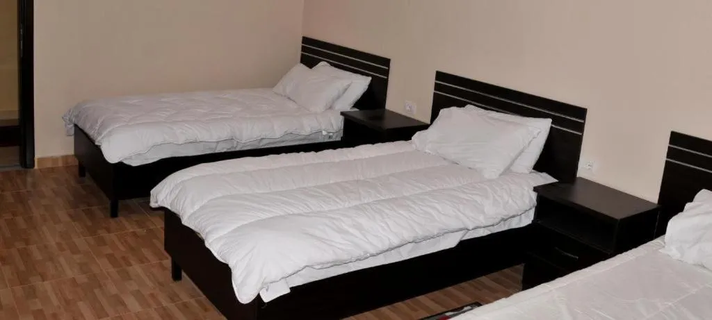 Bed in Garden Hotel