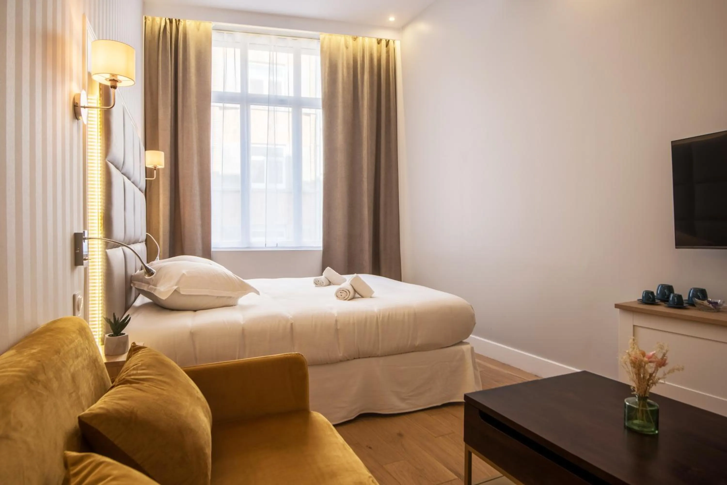 Bed in Les Suites Faidherbe