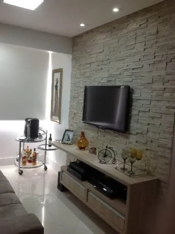 TV and multimedia in Apartamento fino e decorado.