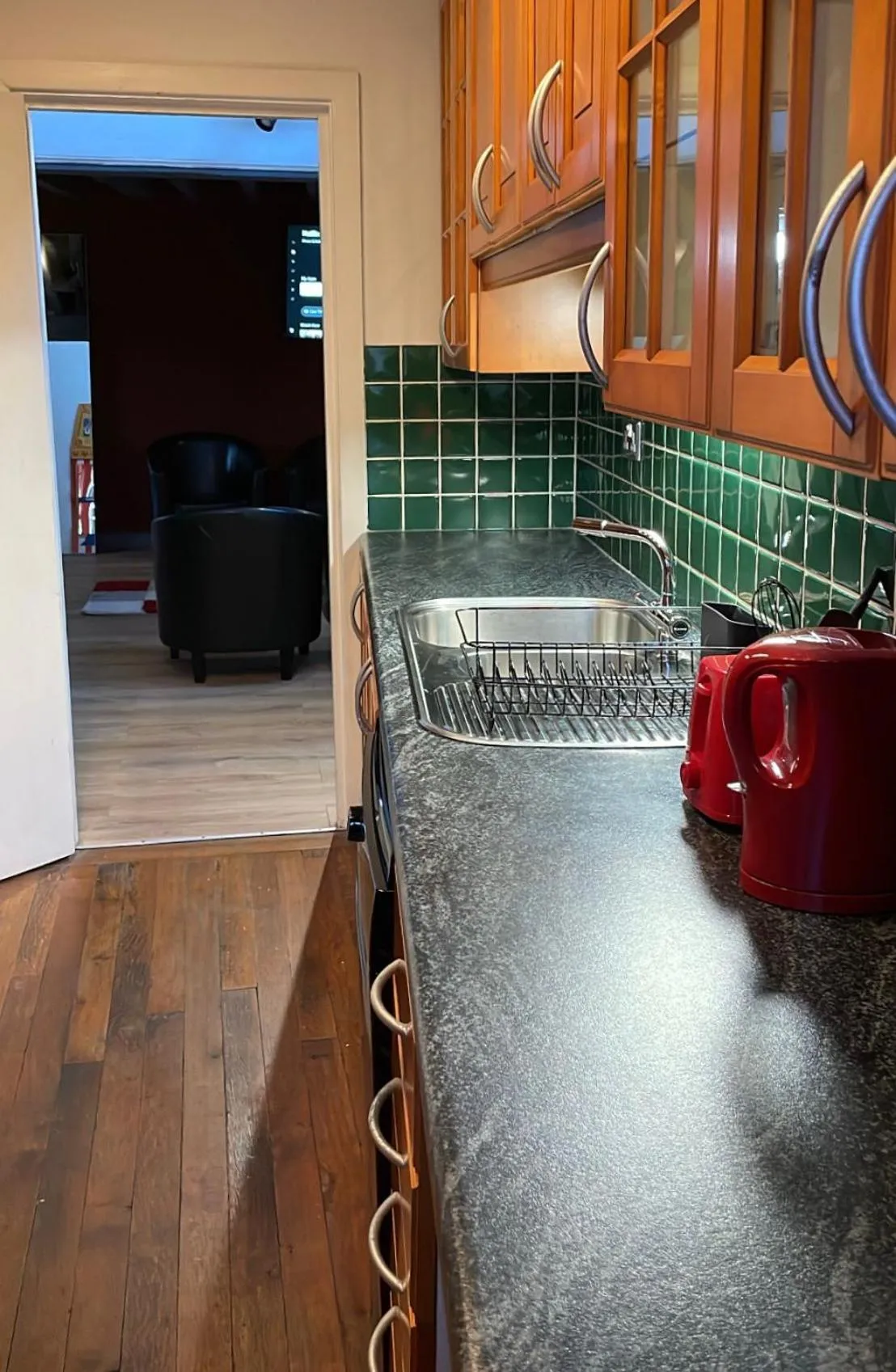 Kitchen or kitchenette in Rainford Gardens by UStay Aparthotels