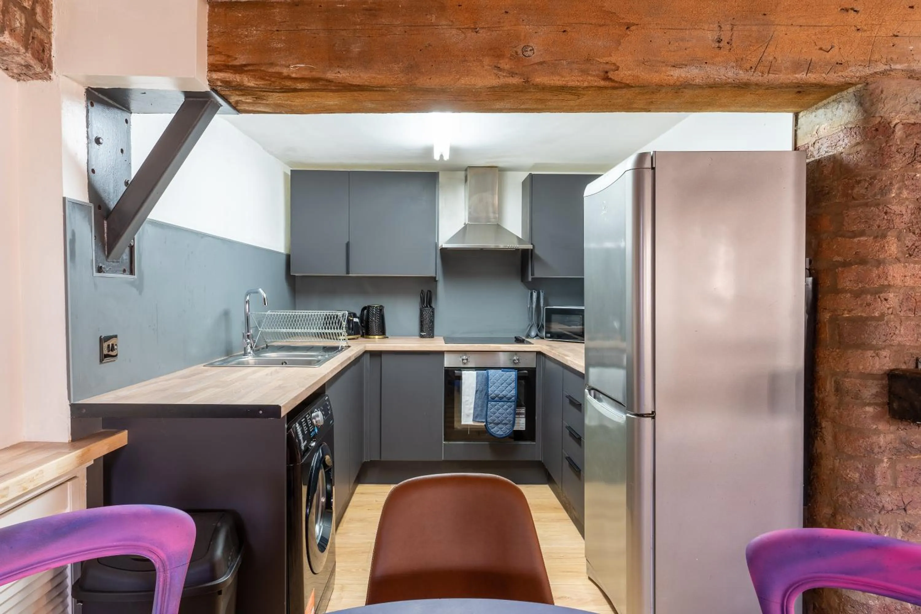 Kitchen or kitchenette in Rainford Gardens by UStay Aparthotels