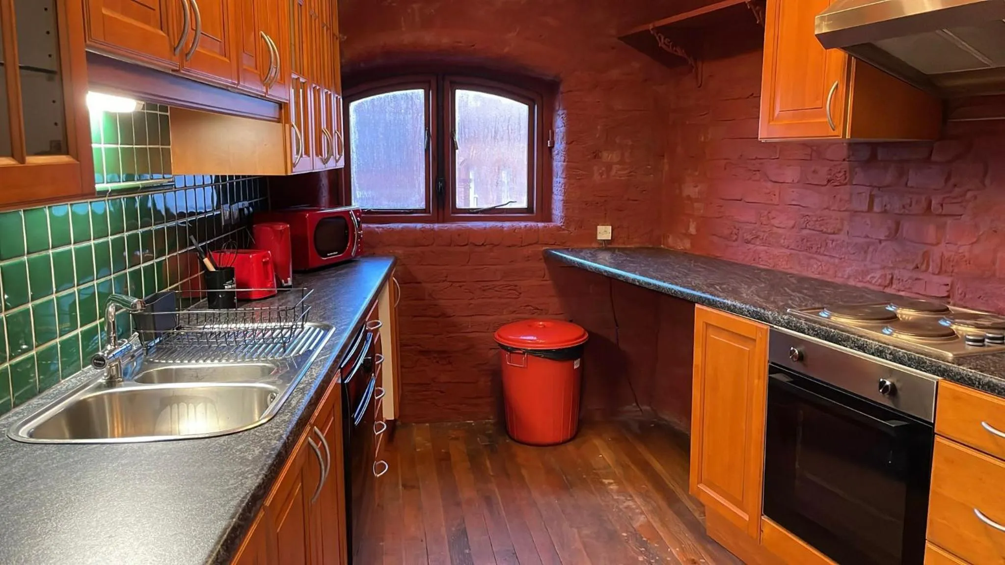 Kitchen or kitchenette in Rainford Gardens by UStay Aparthotels