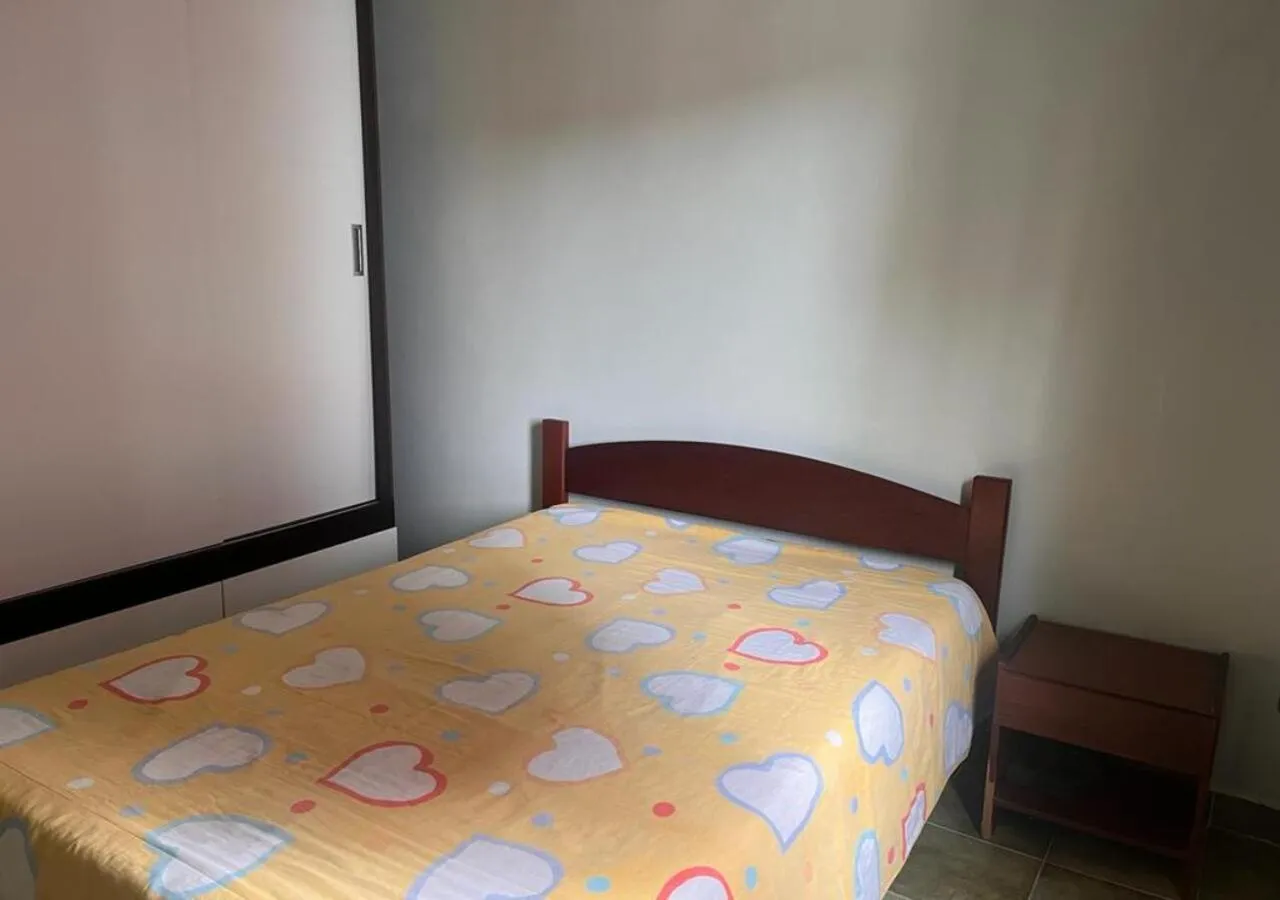 Bedroom, Bed in Apartamento Vila Tupi Praia Grande