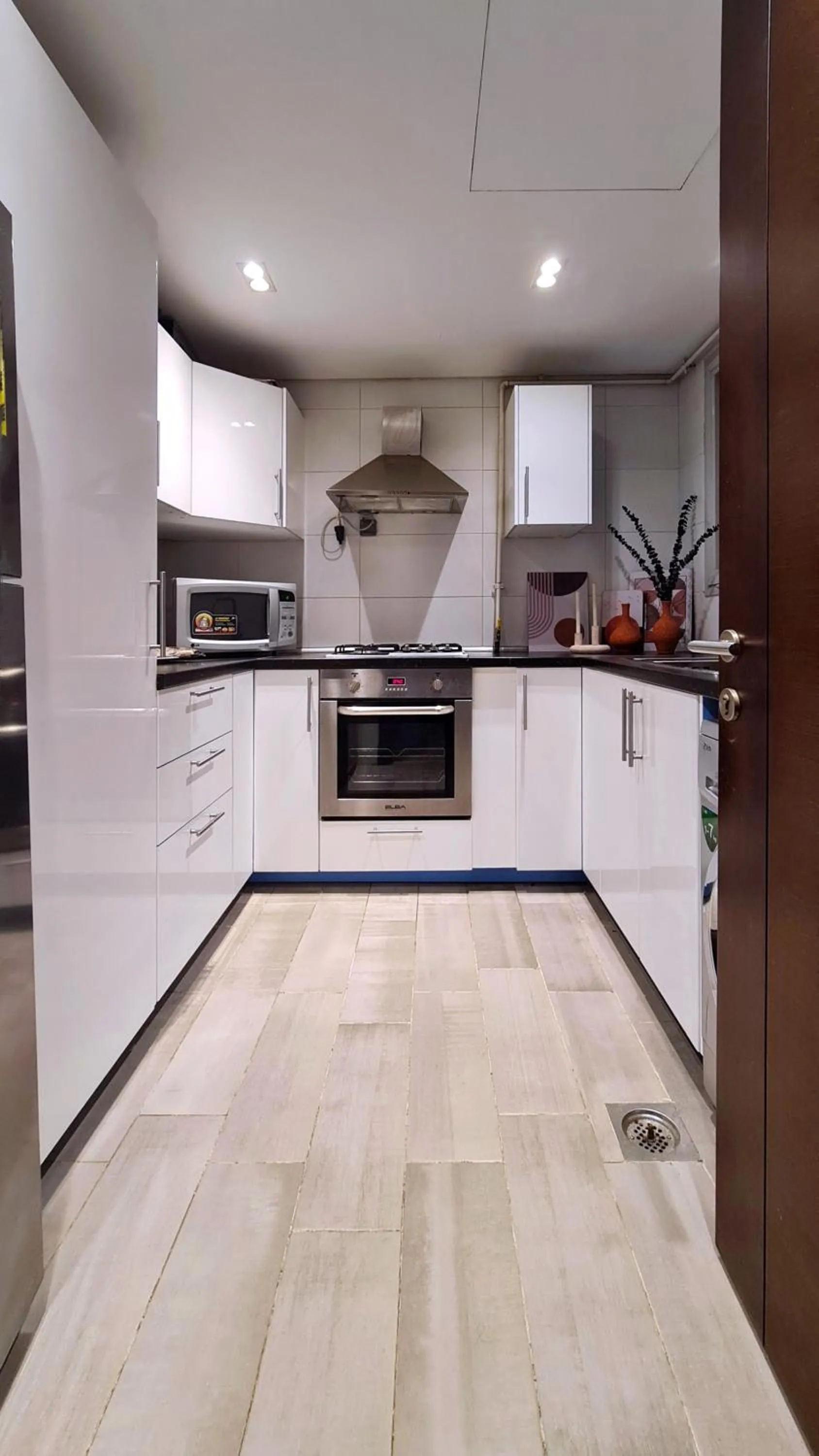 kitchen in Axxodia- Apartments In Cairo Festival City