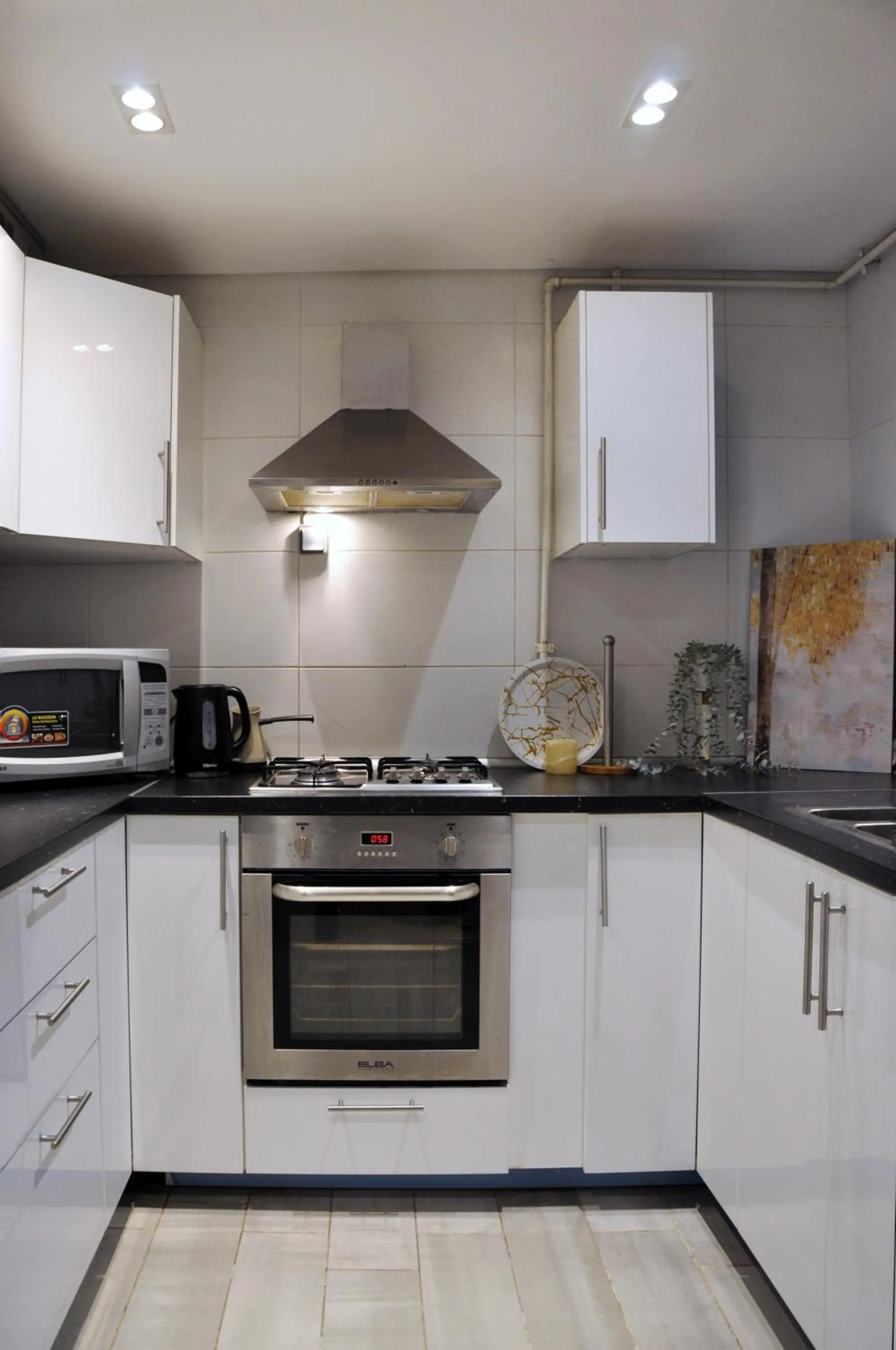 kitchen in Axxodia- Apartments In Cairo Festival City